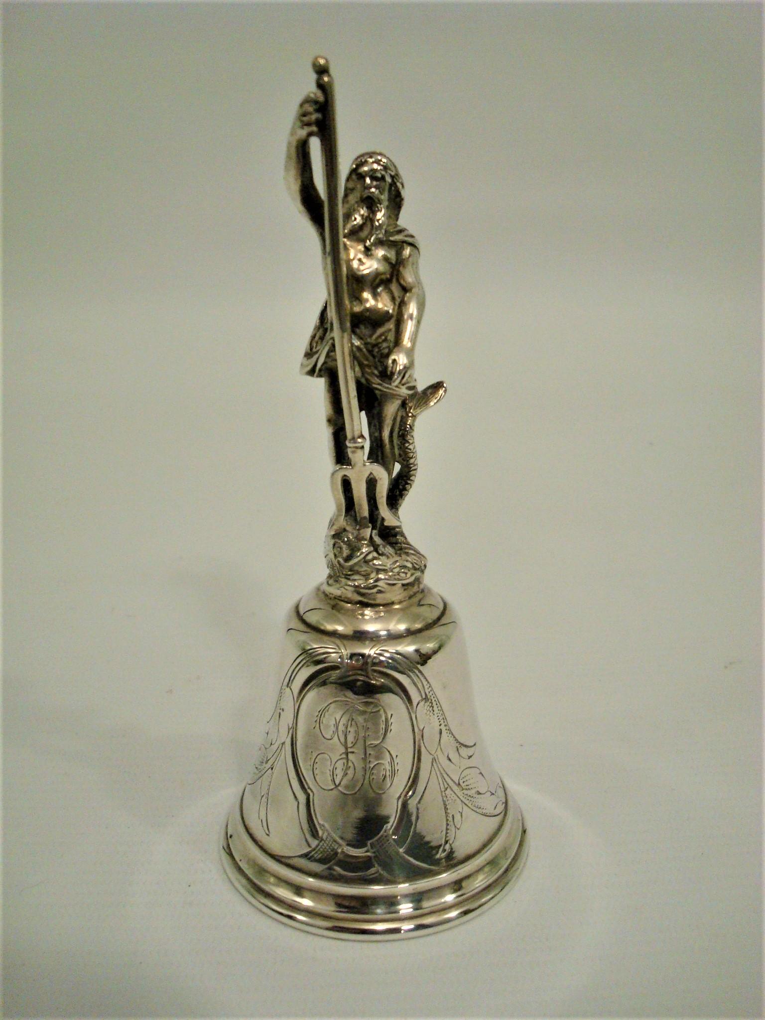 Antique French silver Neptune table bell, circa 1880.
The handle in the form of a Neptune standing with his trident and dolphin, on a domed decorated body.
Perfect gift for any Maritime or sailor fan.