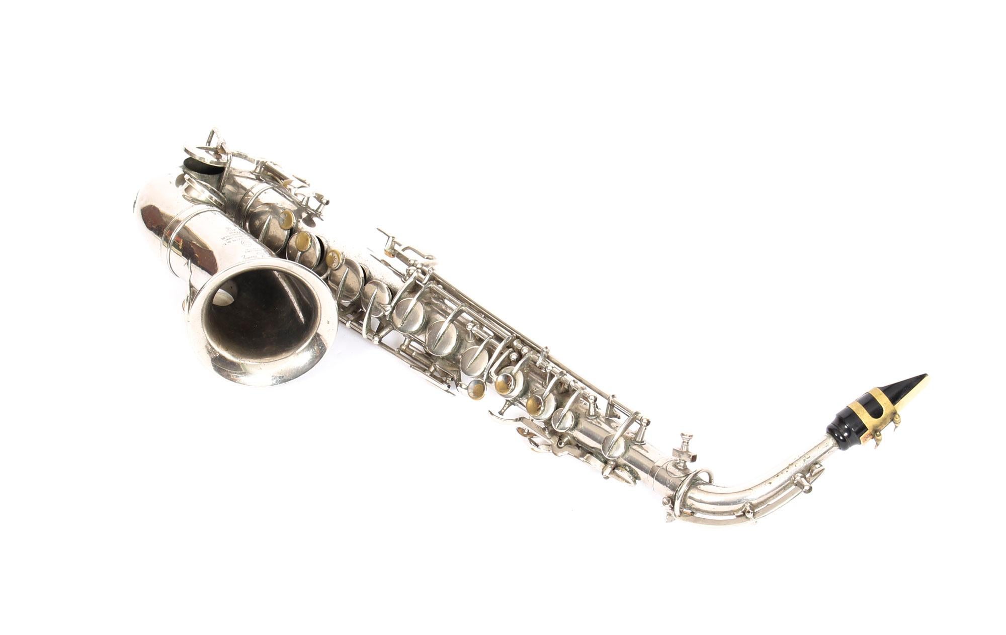 Early 20th Century Antique French Silver Plated Saxophone with Playing Booklet Couesnon et Cie 1929