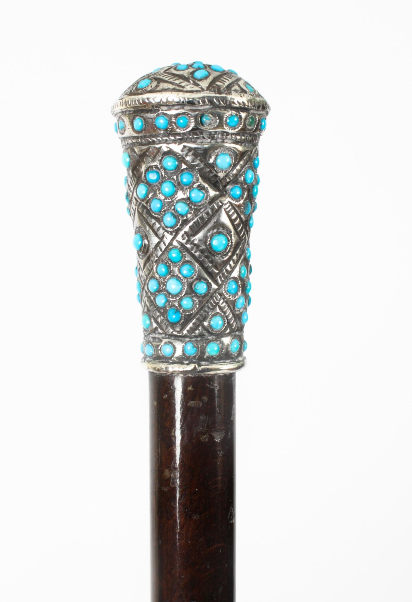 This is a fantastic antique French silver and turquoise handled walking stick, circa 1880 in date.

It has a stunning silver handle which has been beautifully decorated with turquoise stones on a sturdy Malacca tapering shaft which comes complete
