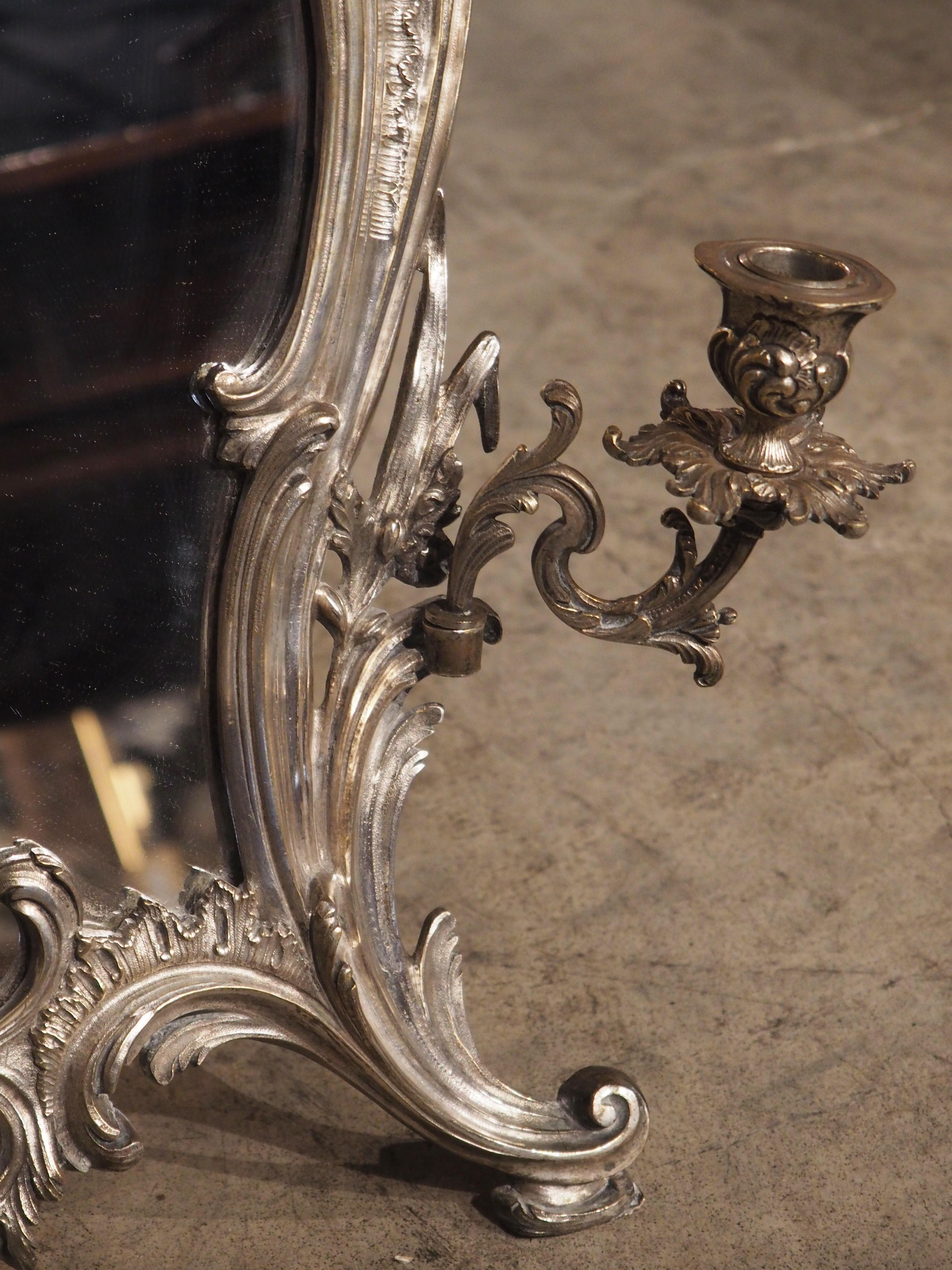 antique mirror with candle holder
