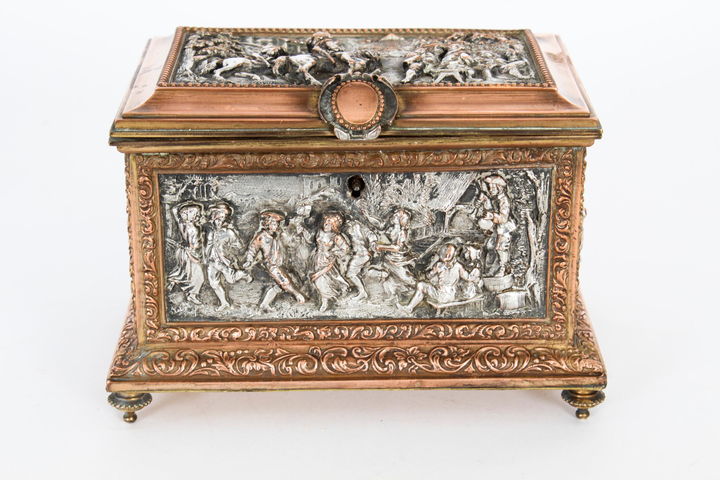 This is a beautiful Antique silvered and gilt on copper French jewellery casket, signed AB Paris and Circa 1880 in date.
 
Of rectangular form this wonderful casket is of very high quality and features the lid and sides decorated with relief cast