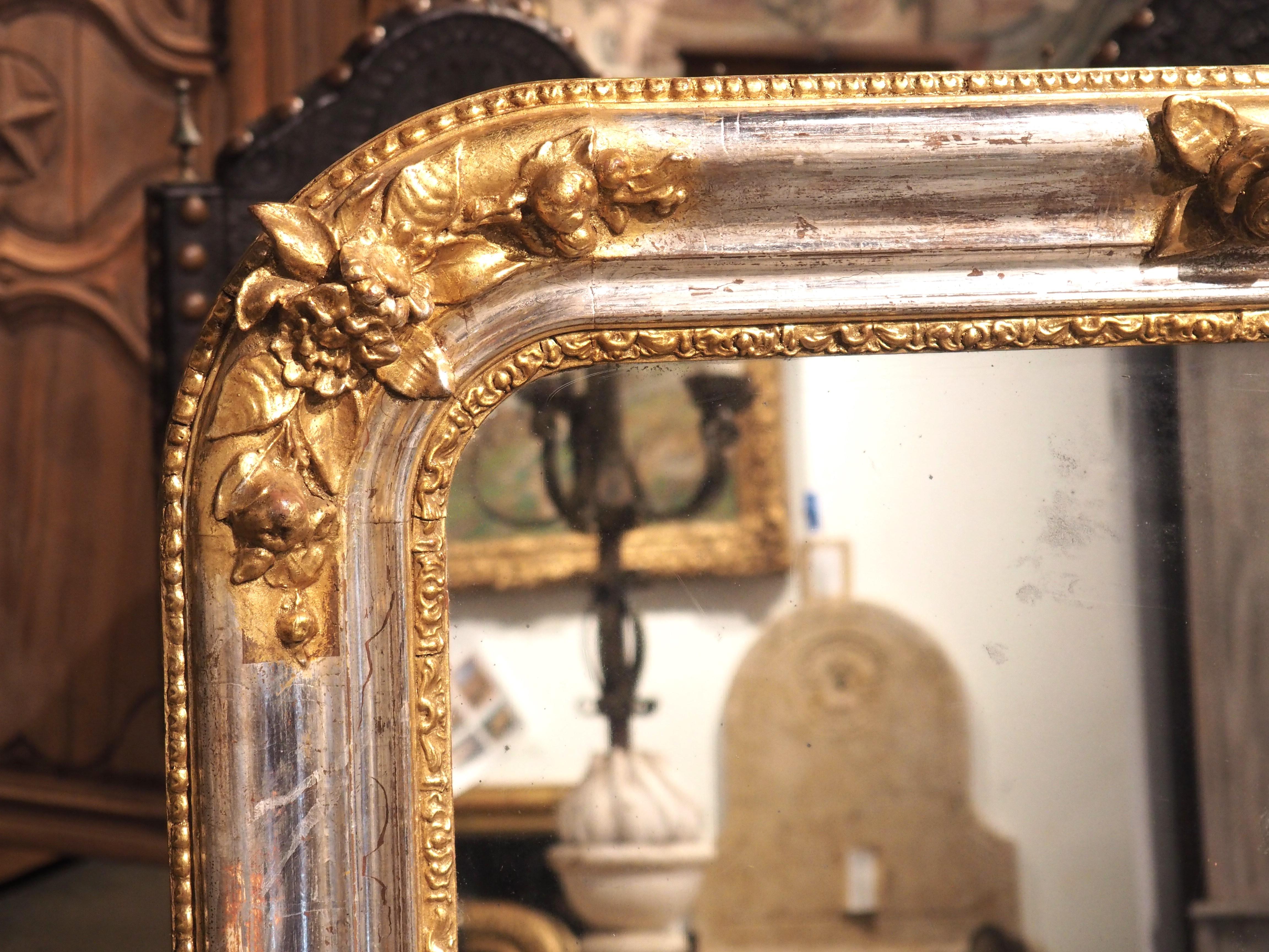 Hand-Carved Antique French Silverleaf Louis Philippe Mirror with Giltwood Floral Accents
