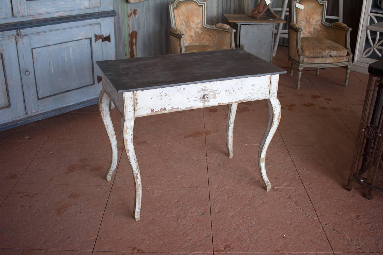 Antique French single drawer table with original scraped back paint and a slate top.