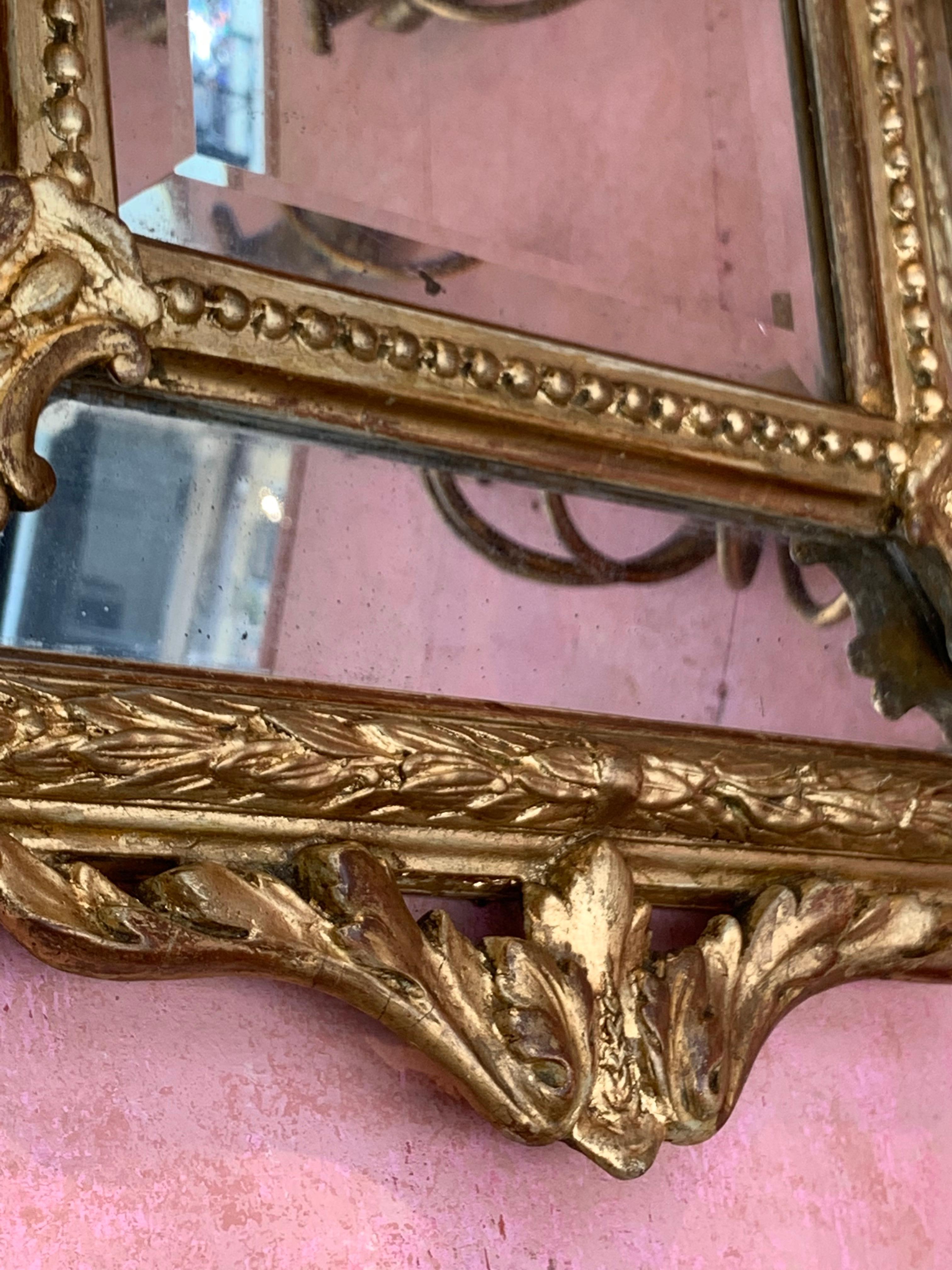 antique cherub mirror