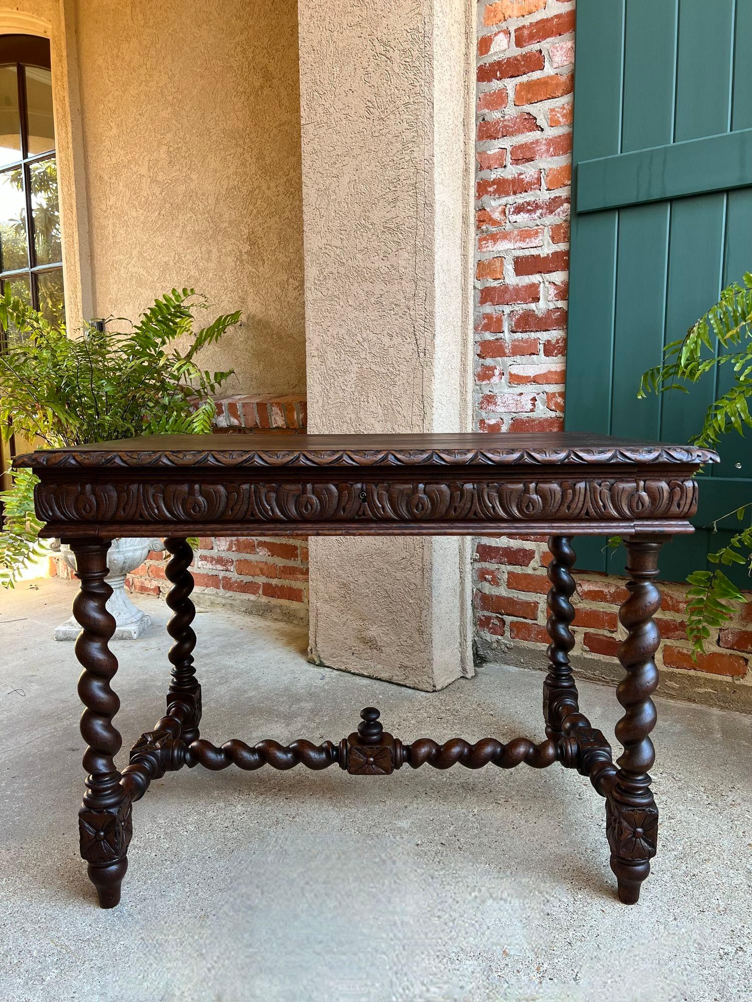 Antique French Sofa Table Writing Desk Barley Twist Carved Oak Renaissance.

Direct from France, a lovely antique French writing desk or sofa table in a very versatile size with beautiful features!!
Large, lovely barley twist legs as well as a long