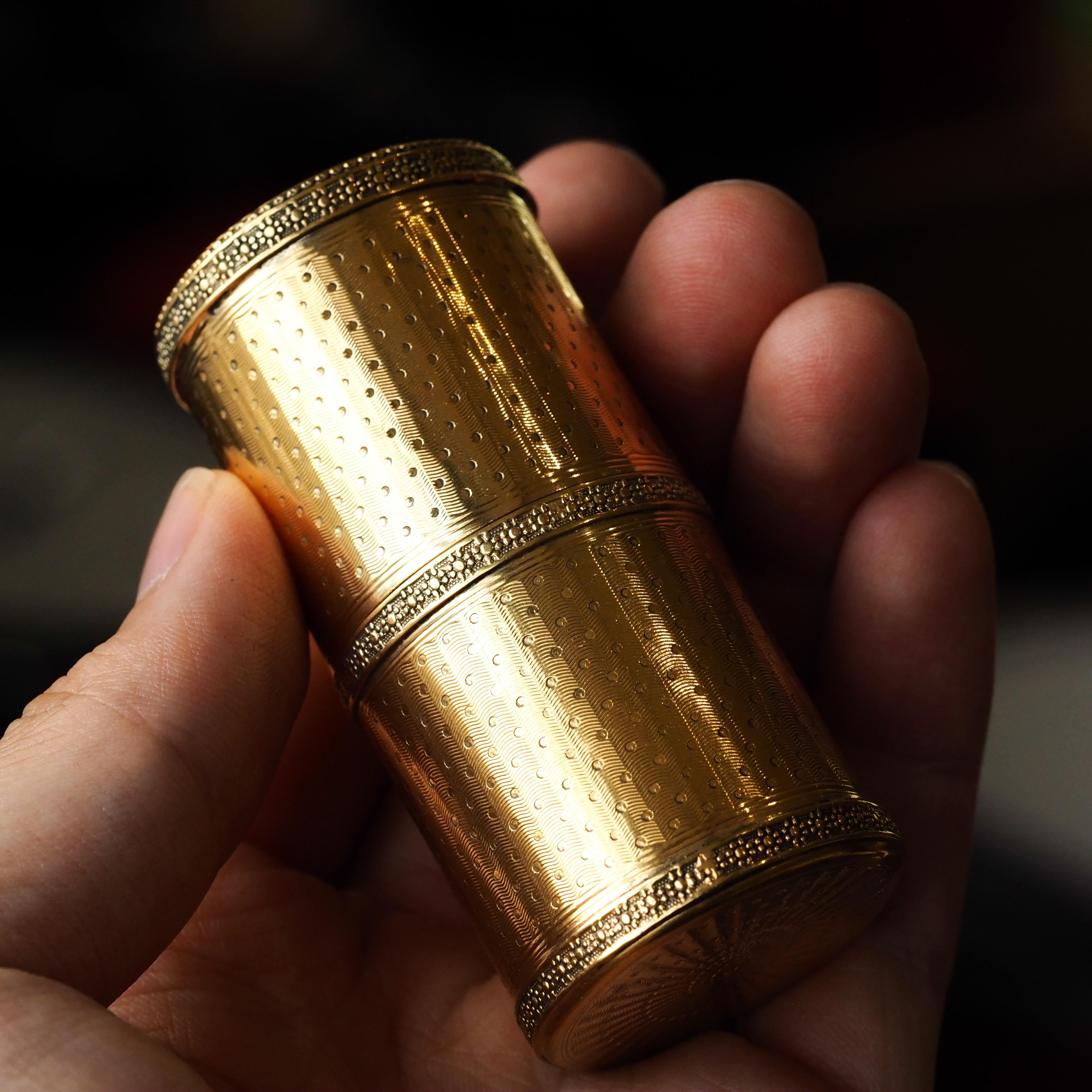 We are delighted to offer this stunning solid silver-gilt cylindrical box made in France, c.1890.

The box features a two-piece pull-off lid design with a fully girl interior and exterior (gold over solid silver). 

In addition to its opulent gold