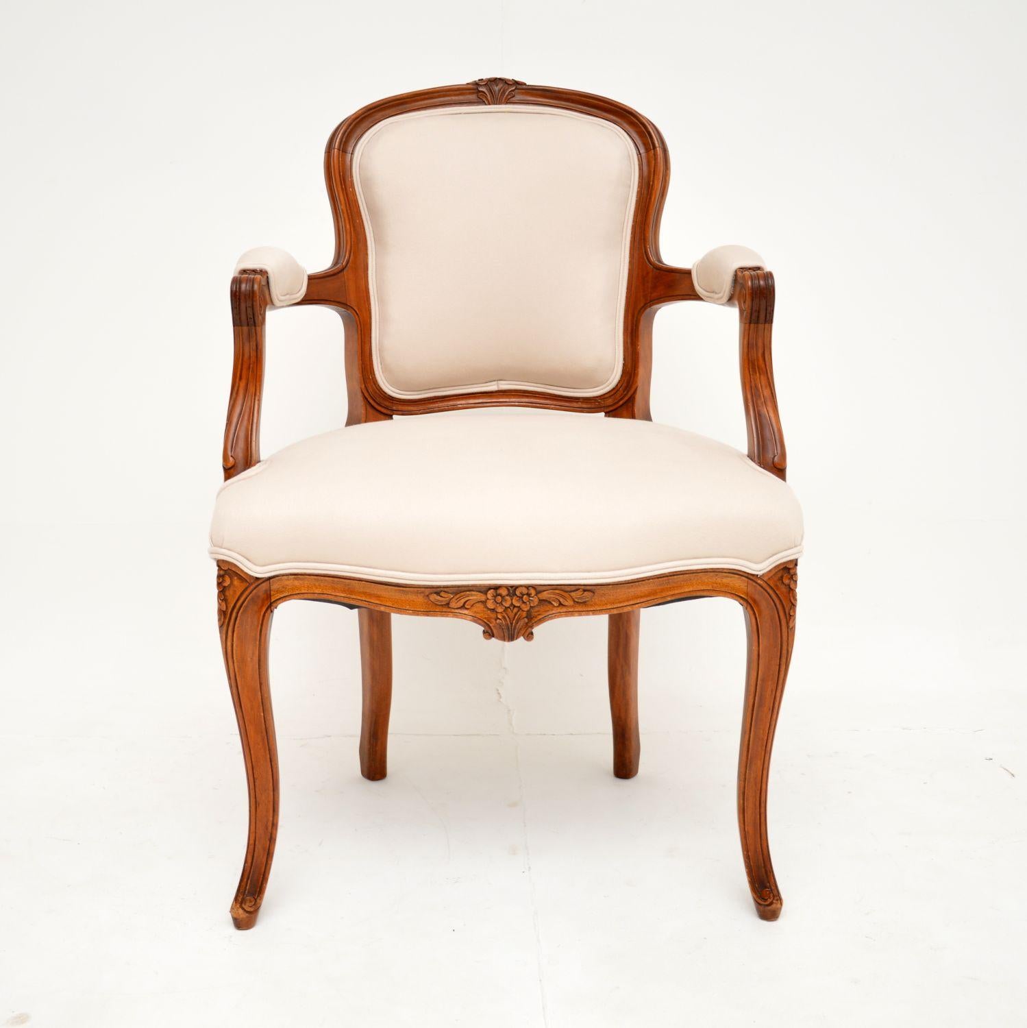 A beautiful and very well made antique French salon chair. This was made in France, it dates from around the 1930’s.

It’s of lovely quality, with a beautiful and elegant design. There is crisp carving throughout, this is a useful size and is very
