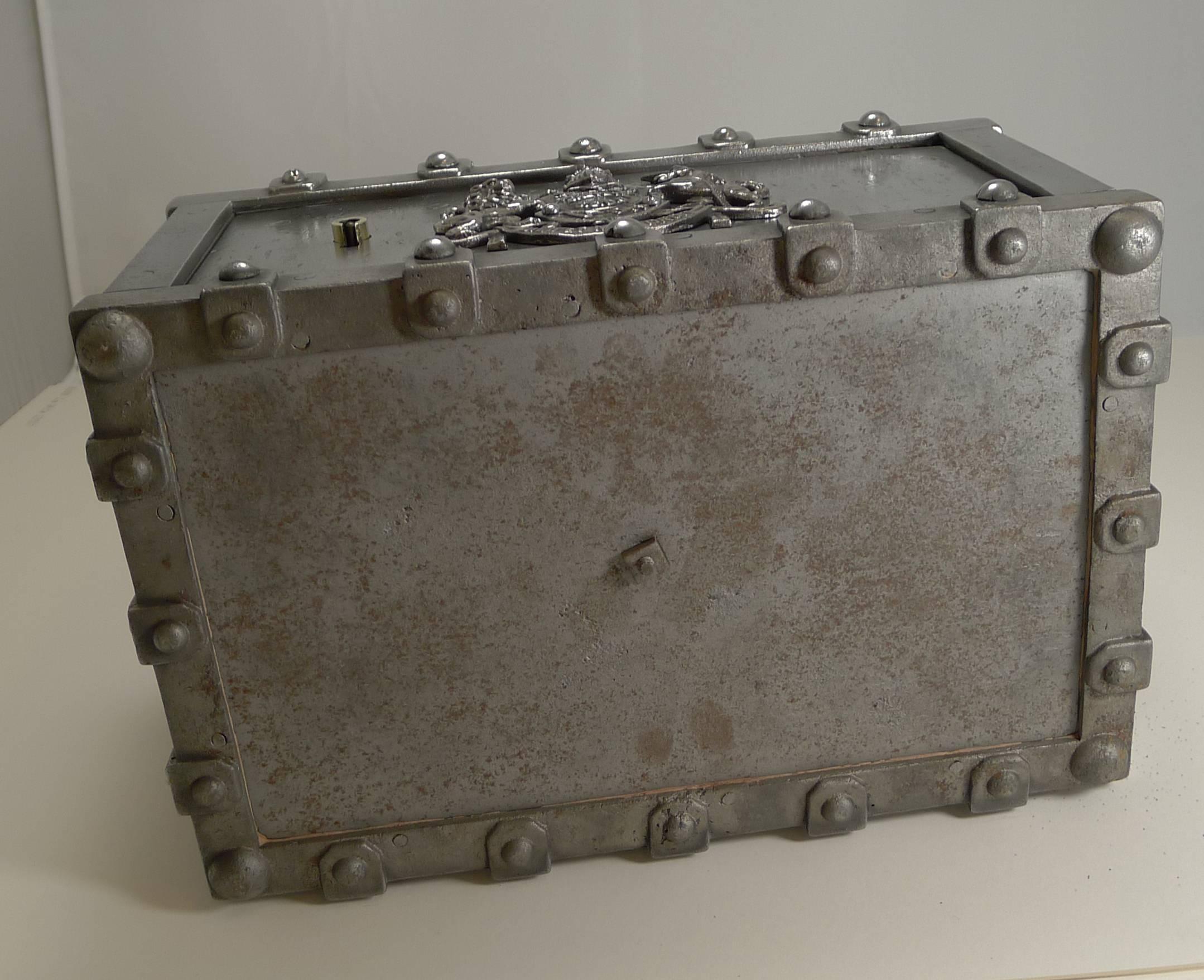 A stunning and very hefty travelling safe, made in France in circa 1870.

The cast iron has been professionally re-polished to create a modern industrial looking gem. This incombustible safe is lined inside, the lining being instrumental in
