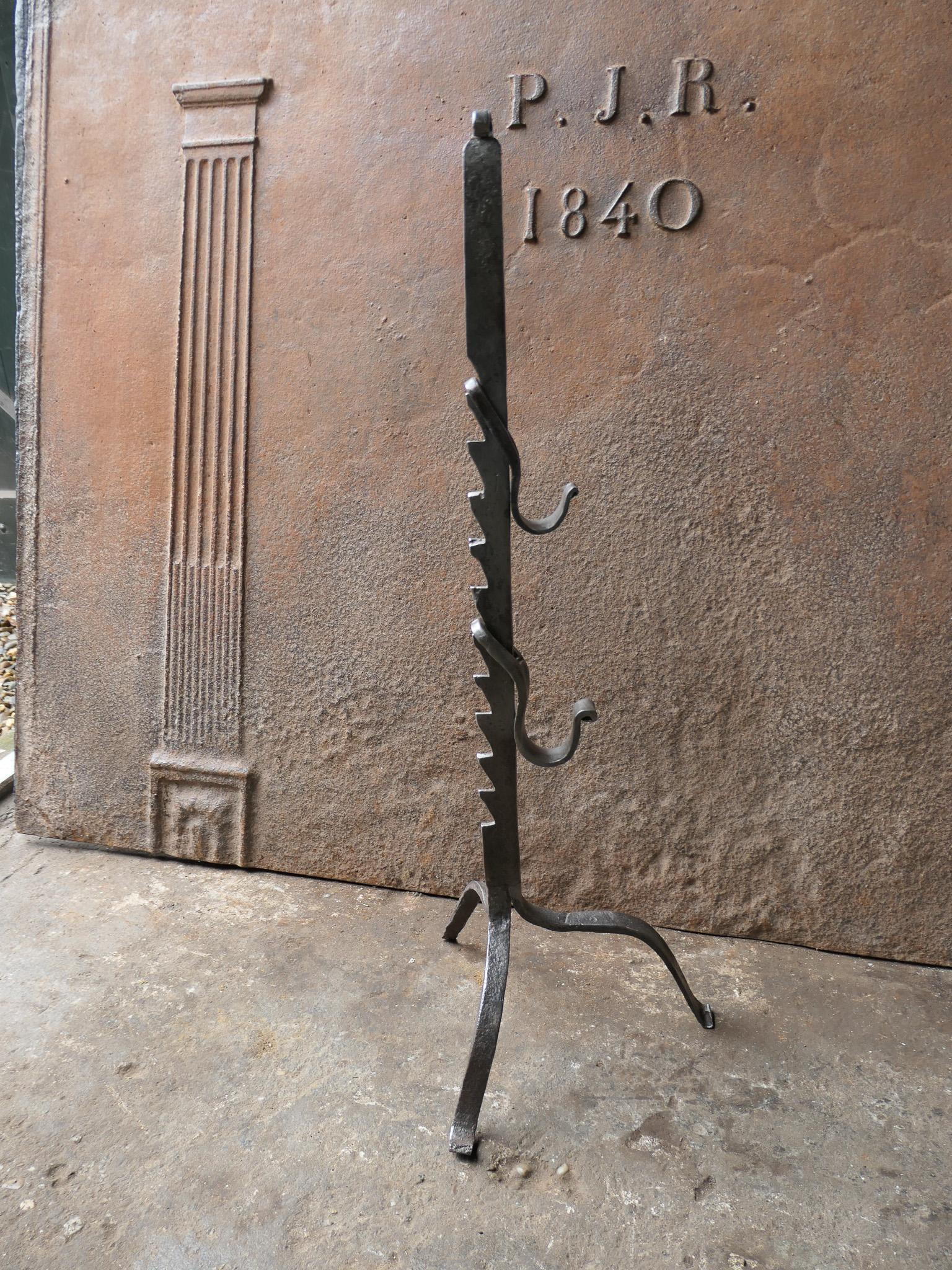 17th - 18th century French Louis XIV period stand for a roasting jack. The stand is hand forged and made of wrought iron. The condition is good.


