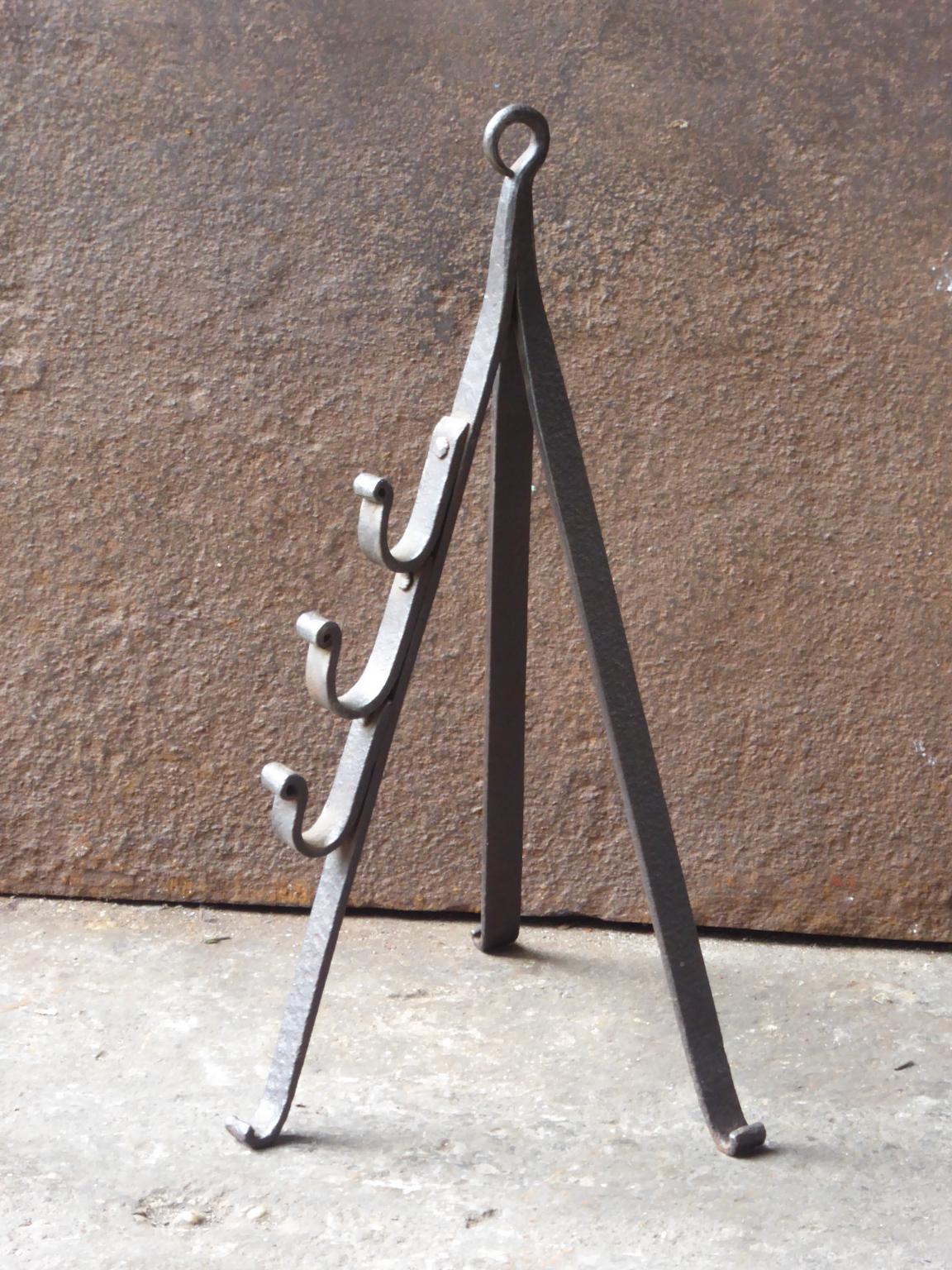 Late 18th or early 19th century French neoclassical period stand for a roasting jack. The stand is hand forged and made of wrought iron. The condition is good.







