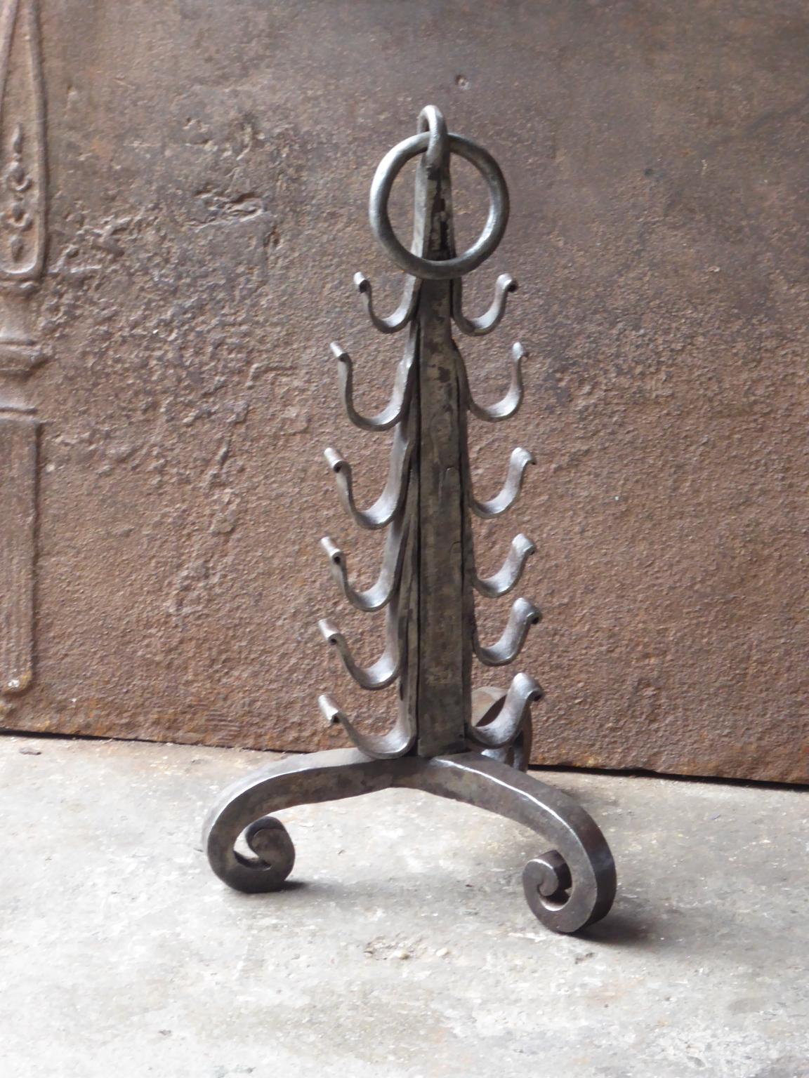 Beautiful 18th century French Louis XV period stand for a roasting jack. The stand is hand forged and made of wrought iron. The condition is good.







