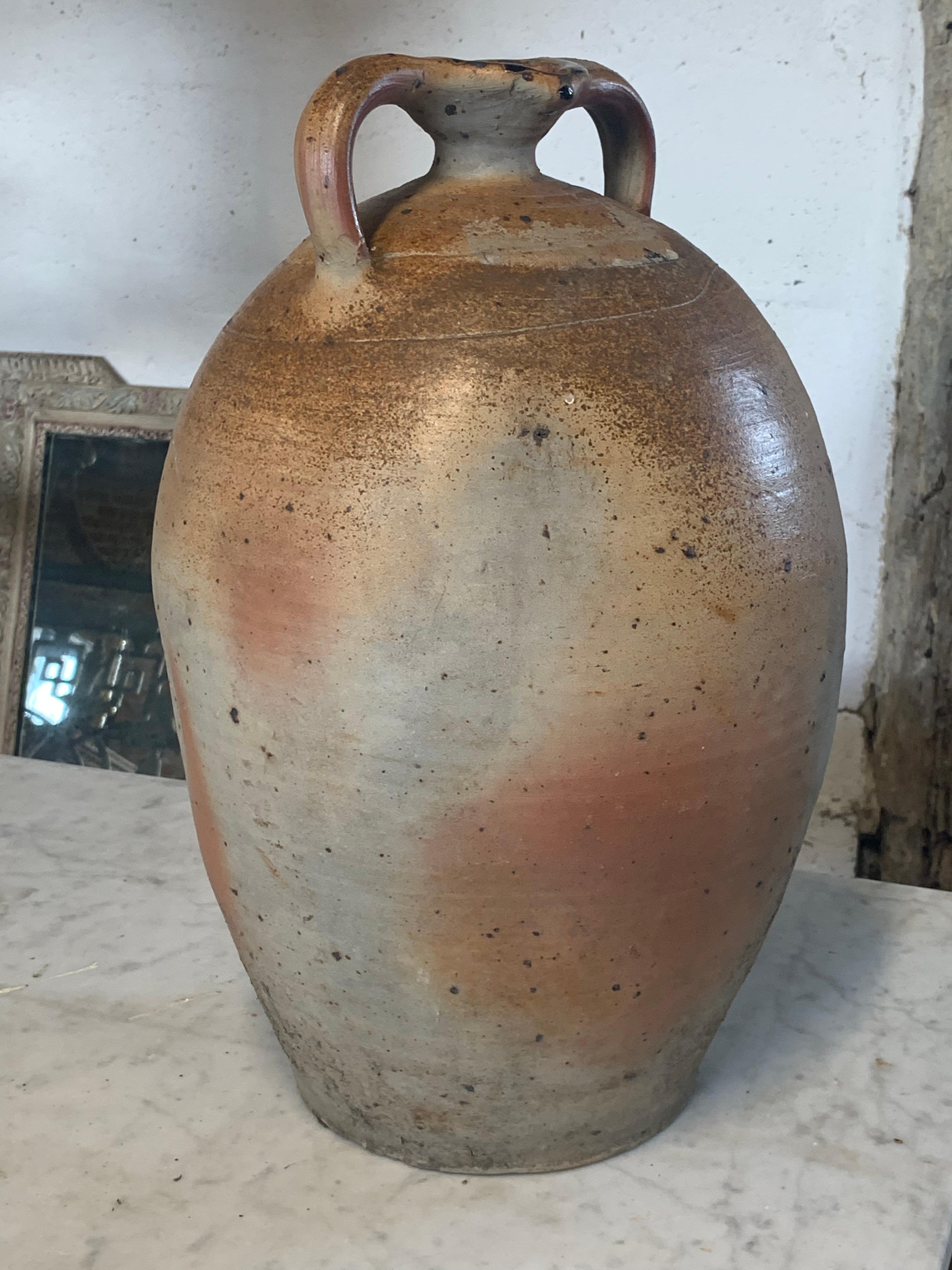 A nice French stone flagon with double handles. Late 18th early 19th century.