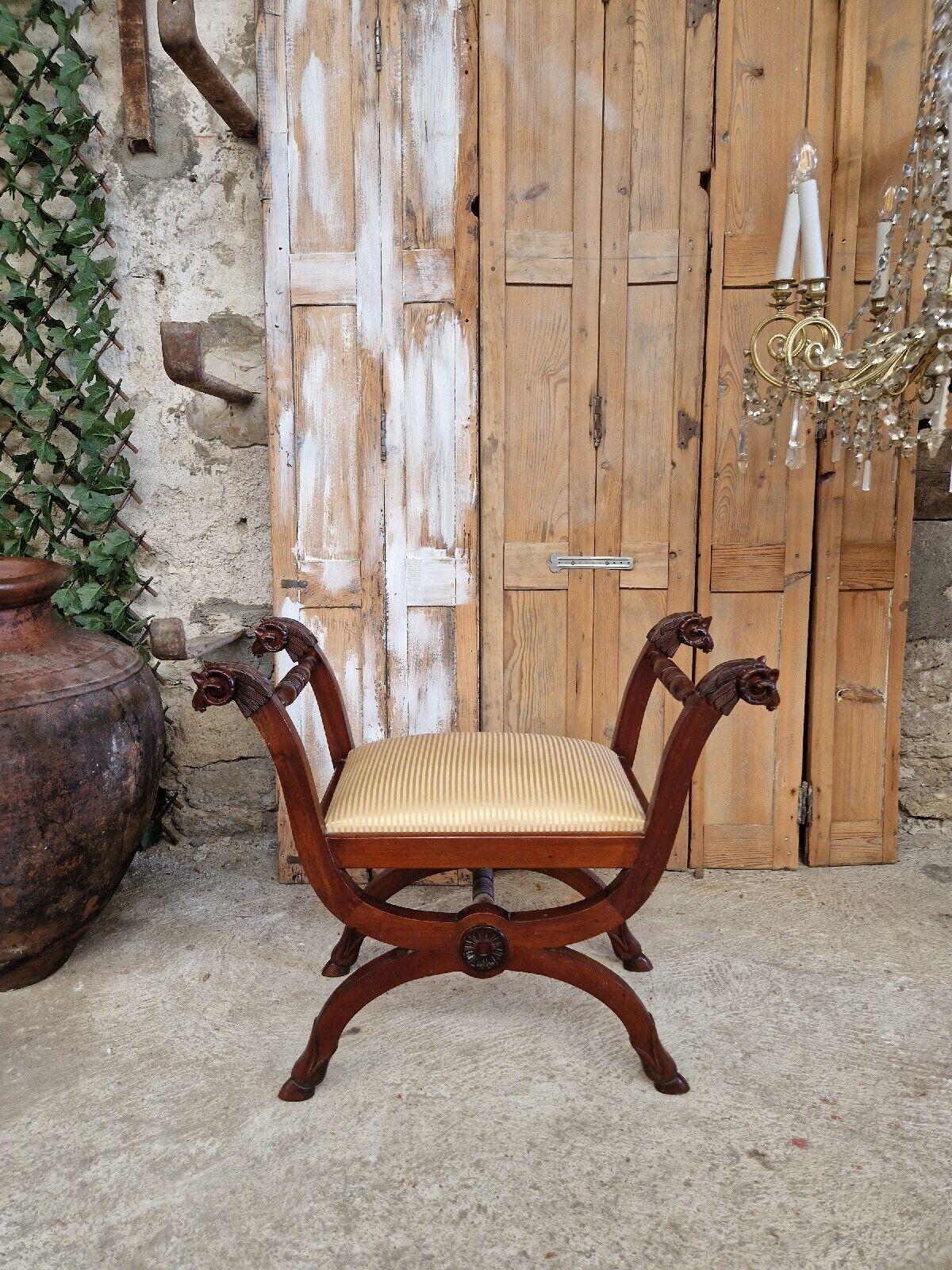 We are delighted to offer for sale this Fabulous Antique French Tabouret 

Empire Style
Tapered & Fluted Legs

Upholstered Seat Panel in Cream Cotton Stripe Fabric

Rams Head Mounts (Age related imperfections)

Dimensions

78cm x 65 H x 36cm

Seat