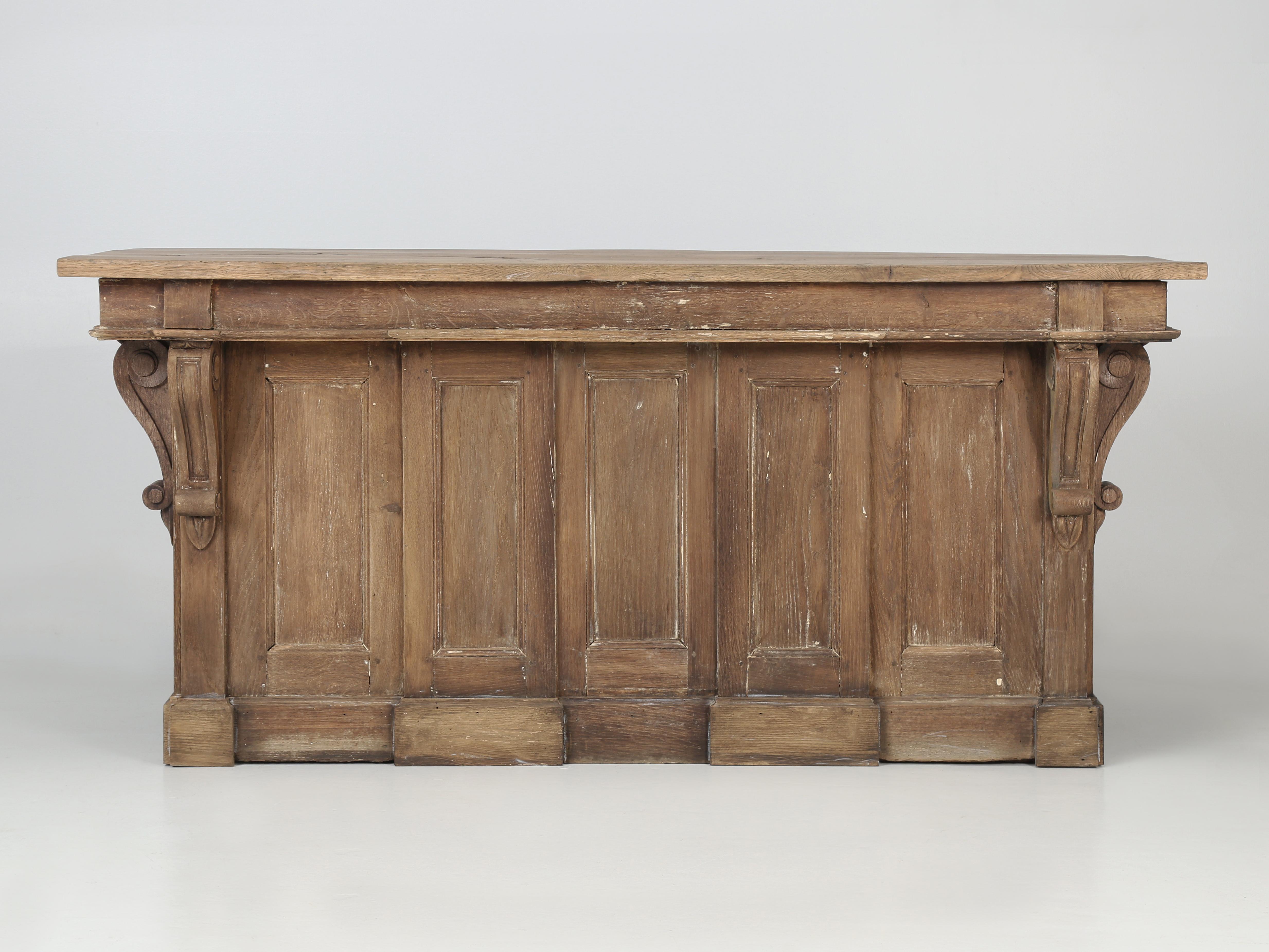 Hand-Carved Antique French Store Counter Repurposed into a Kitchen Island From The Provence For Sale