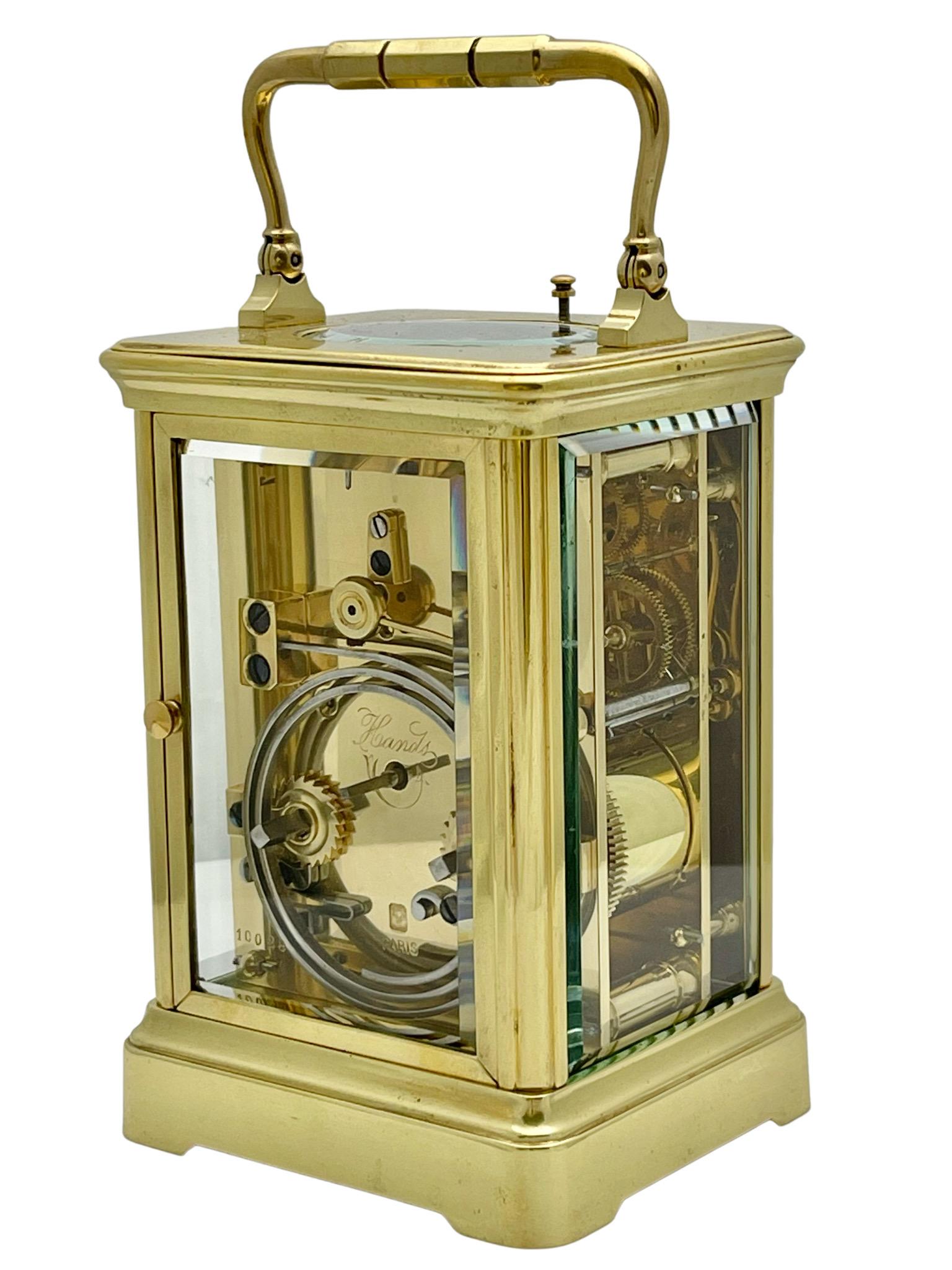 Glazed Antique French Striking and Repeating Polished Brass Henri Jacot Carriage Clock For Sale