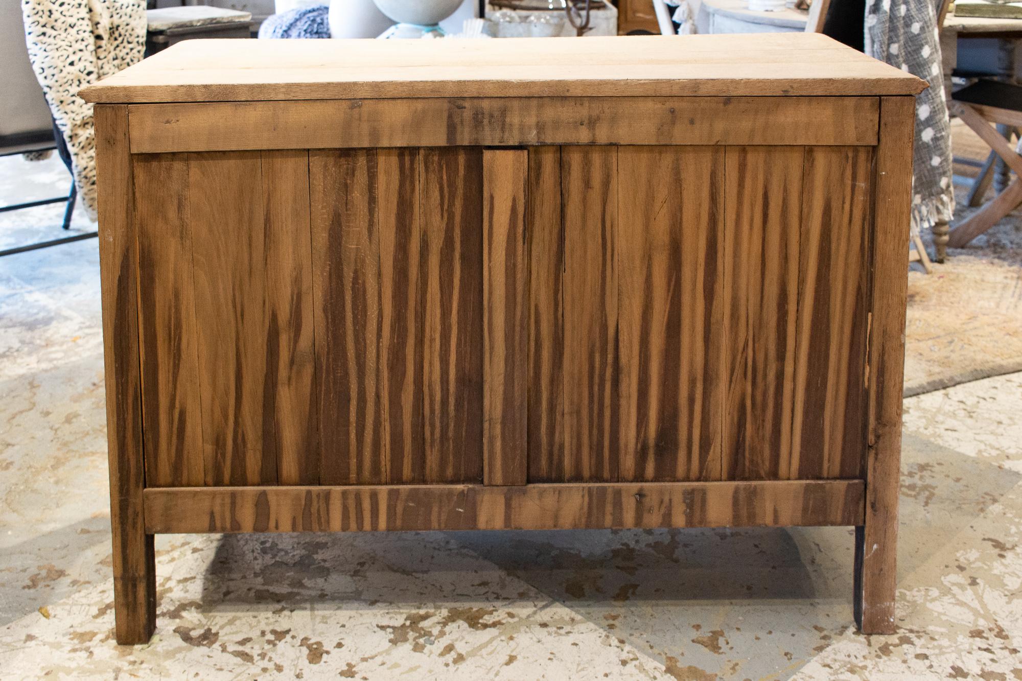 Early 20th Century Antique French Stripped Wood Three-Drawer Commode with Carved Details