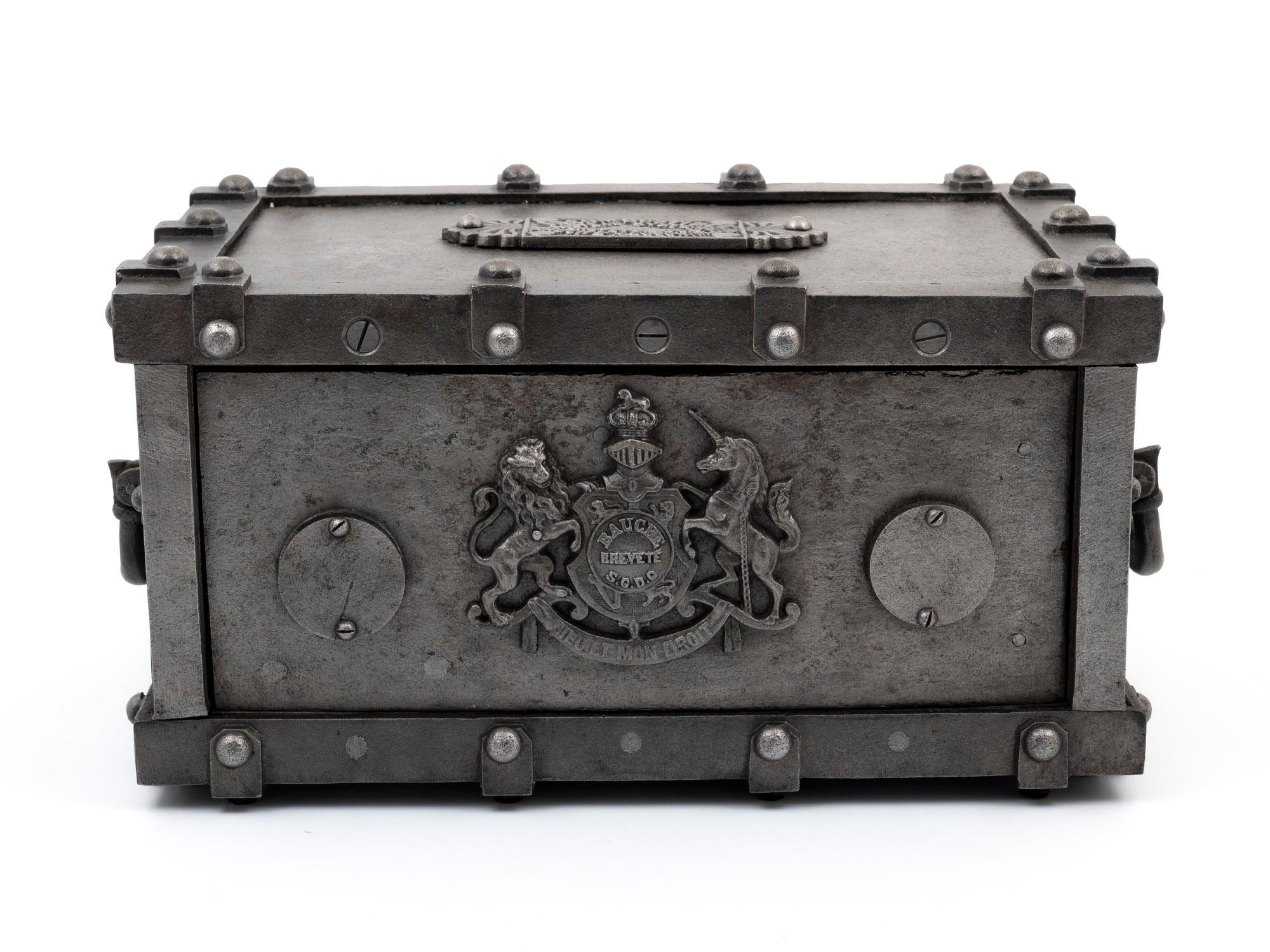 Cast Iron French strong box by Bauche Brevete

With a raw polished iron finish and a beautifully detailed Royal Coat of Arms for the United Kingdom mounted on the front complete with the motto: 