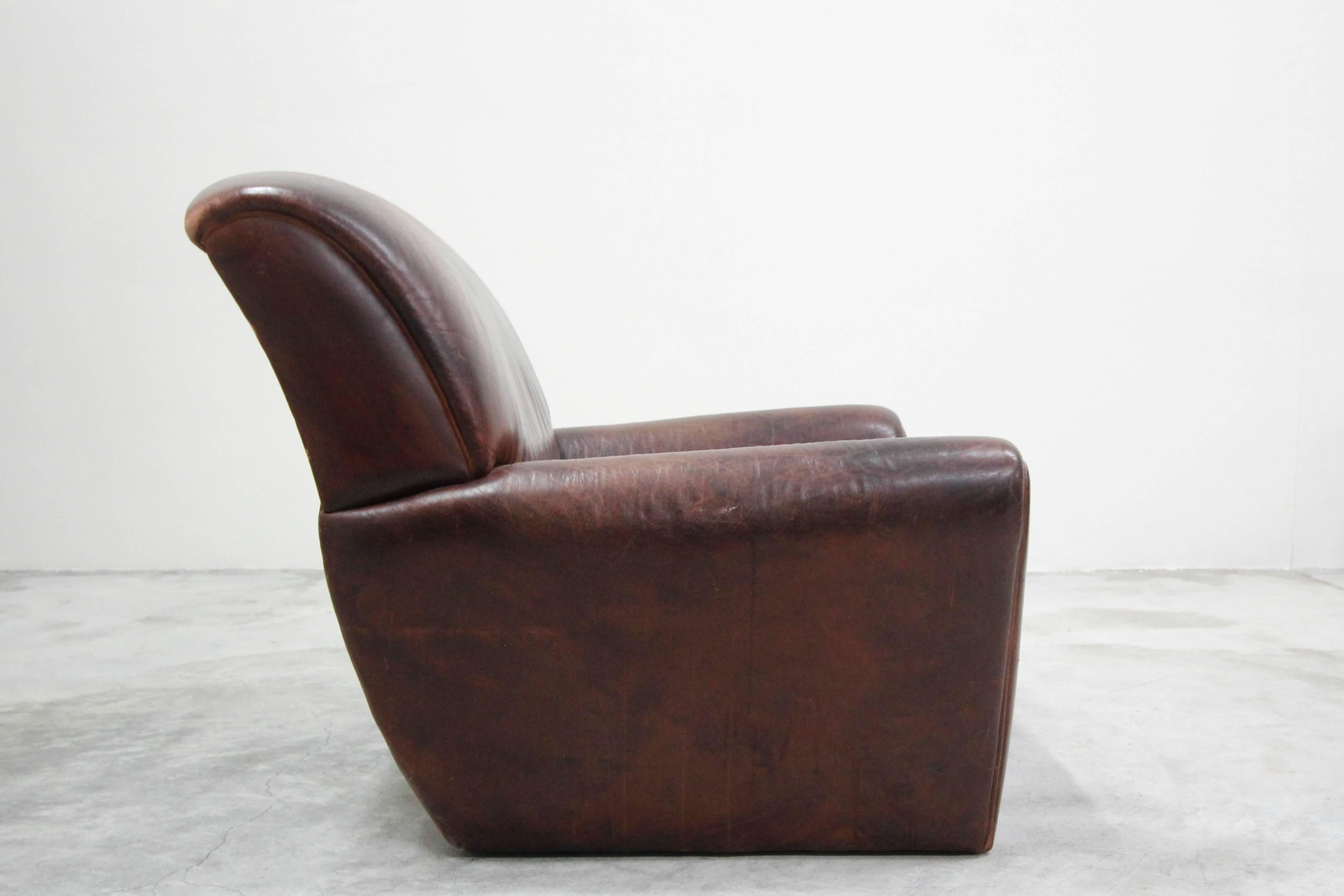 20th Century Antique French Style Aged Leather Lounge Chair