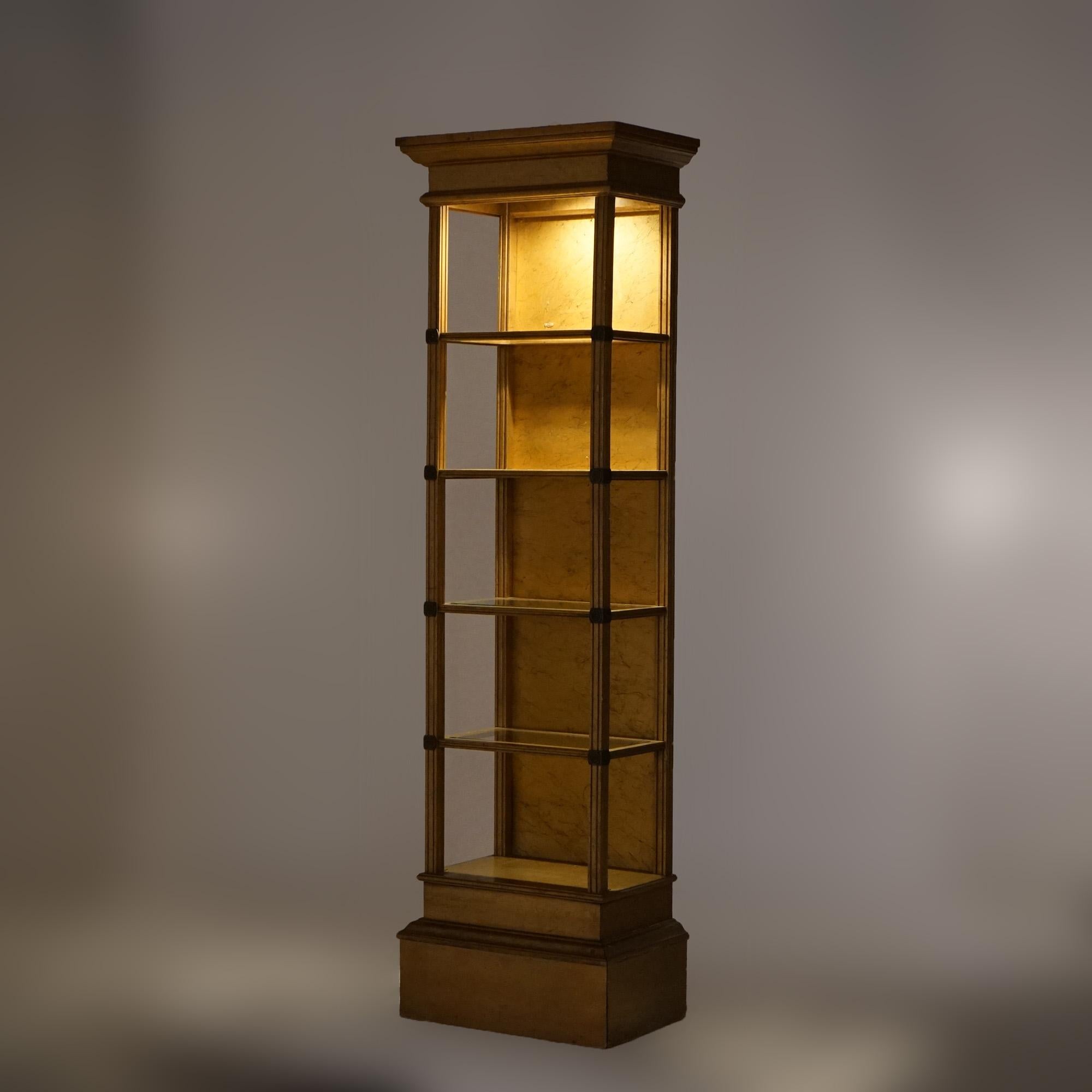 An antique French style display cabinet offers giltwood construction with five open shelves, lighted, 20th century

Measures- 77''H x 22''W x 14''D