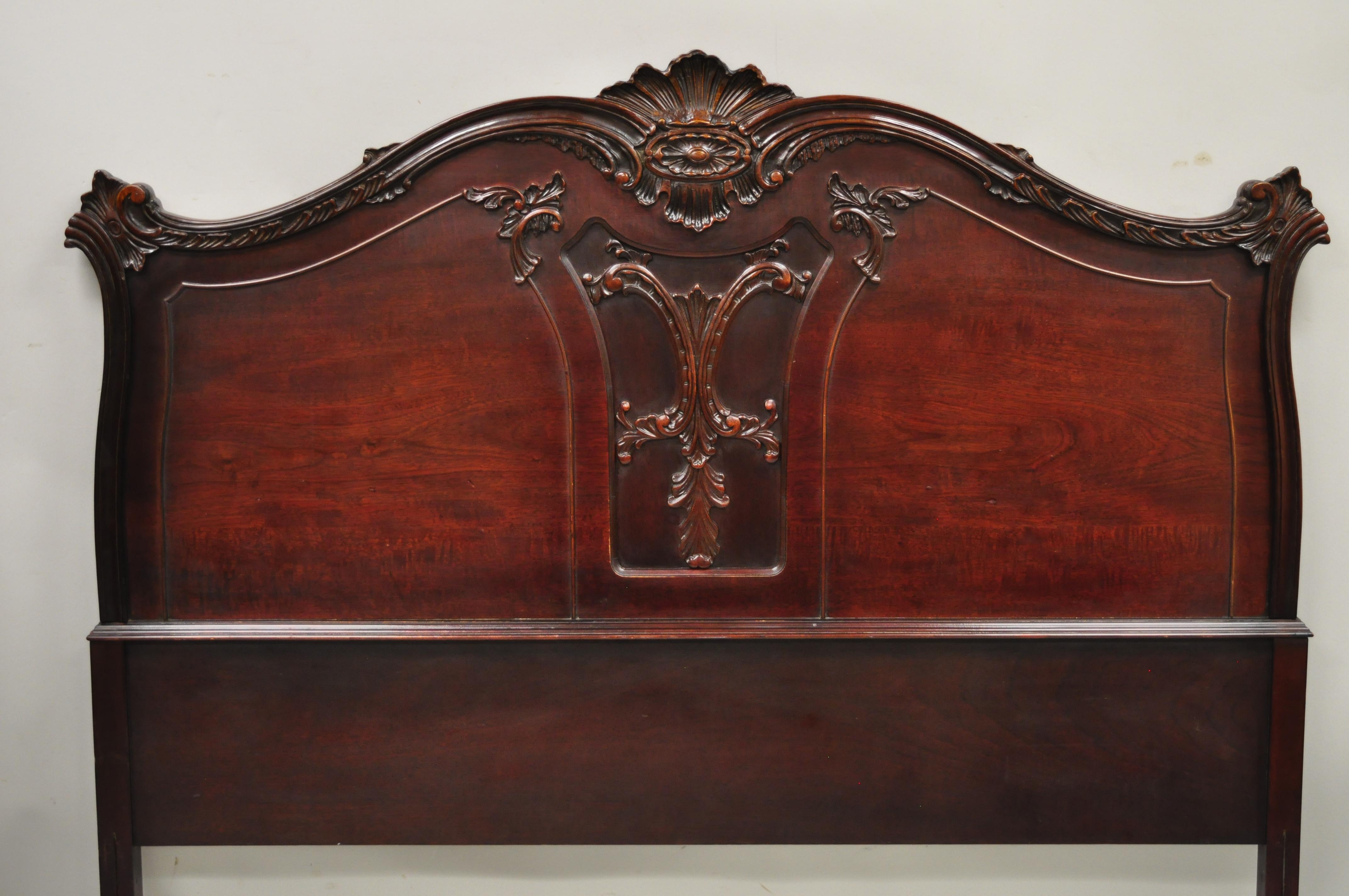 Antique French Style Hollywood Regency carved mahogany full size bed headboard. Item features beautiful wood grain, nicely carved details, very nice antique item, quality American craftsmanship, great style and form. Circa Early to Mid 1900s.