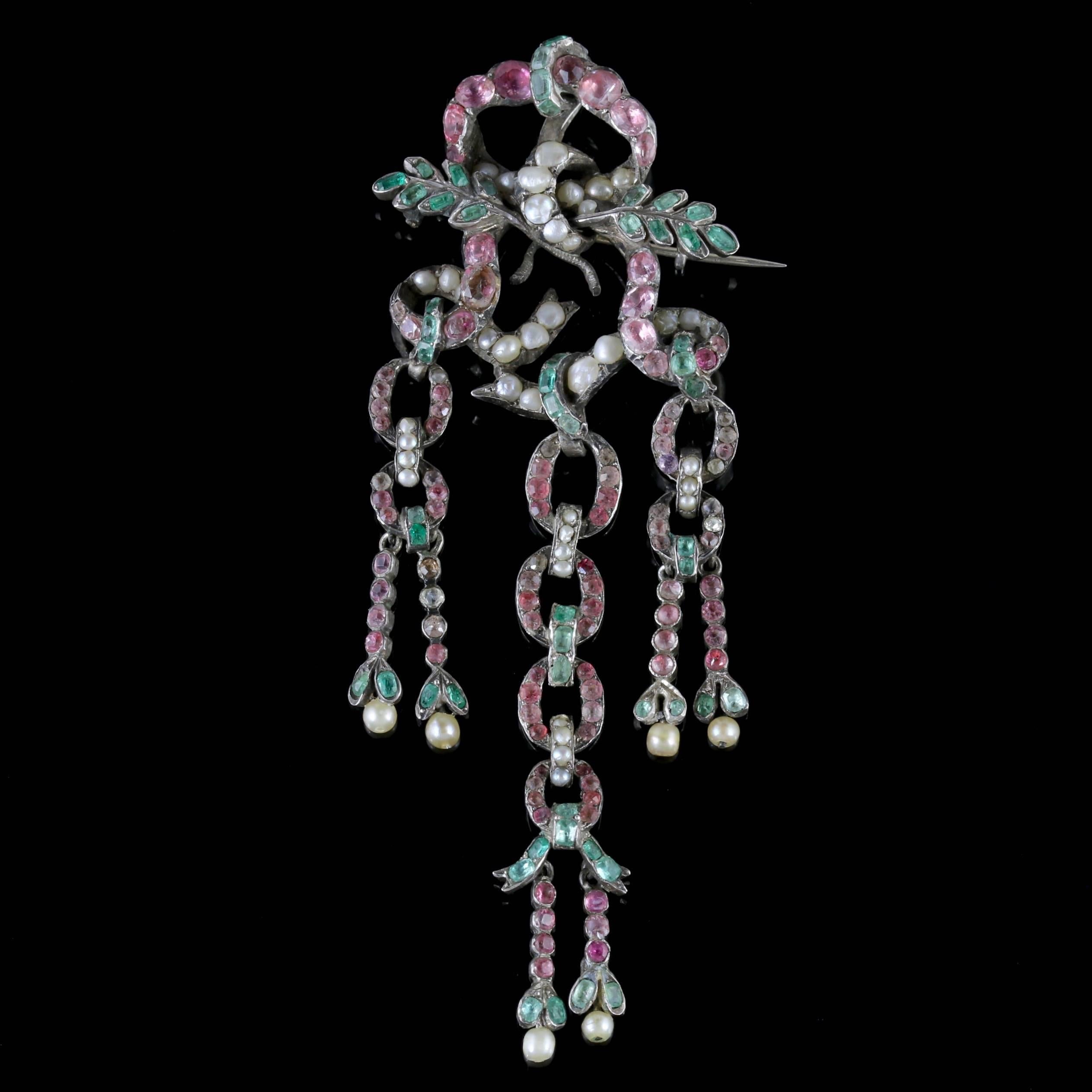 To read more please click continue reading below-

This fabulous antique French dropper brooch was made during the Victorian era, Circa 1900.

The beautiful brooch boasts three long chain link droppers with two more droppers dangling from each.