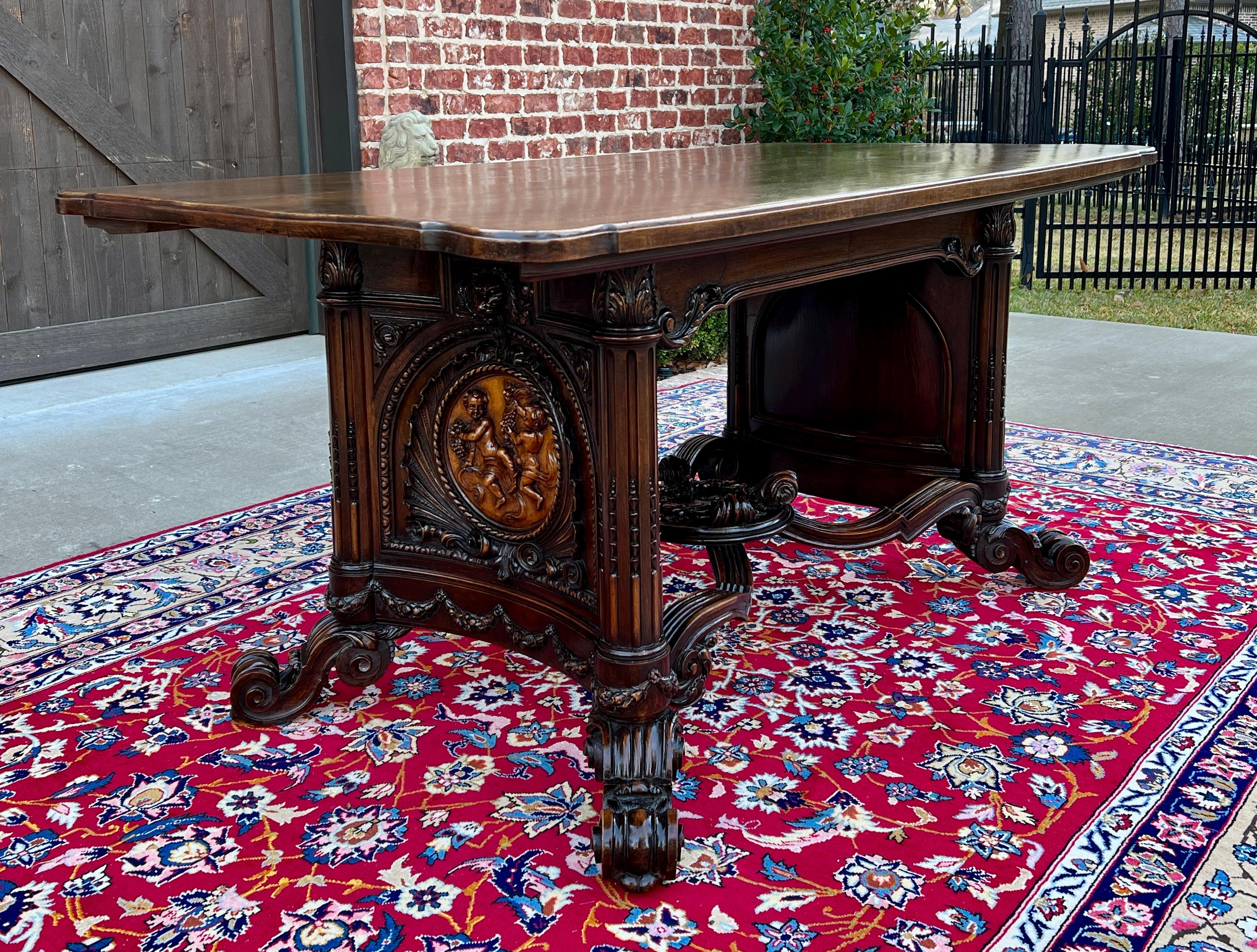 SUPERB Antique French Renaissance Revival Oak Breakfast Dining Table or Writing Desk ~~HIGHLY CARVED~~Cherubs~~

This table is a true 