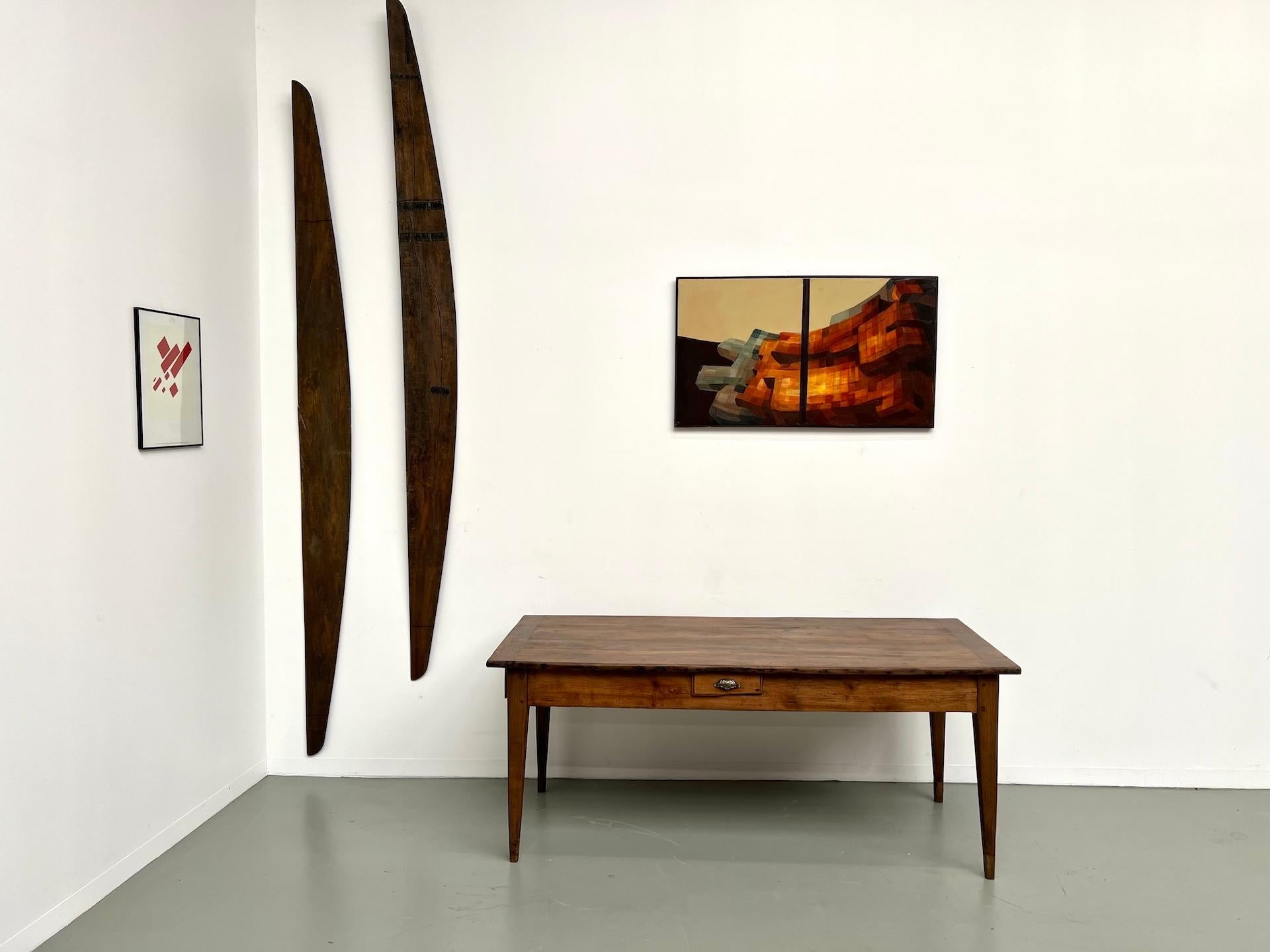 Maison Lecan presents this beautiful antique table in solid oak, dating from around 1890.

Its large patinated top rests on four elegant tapered legs that give it a light and balanced look. The table is fitted with two deep through-drawers (74 cm