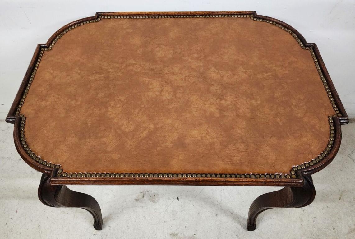 For FULL item description click on CONTINUE READING at the bottom of this page.

Offering One Of Our Recent Palm Beach Estate Fine Furniture Acquisitions Of An
Antique Country French Oak Side End Center Table with Leather Top and Brass Nail