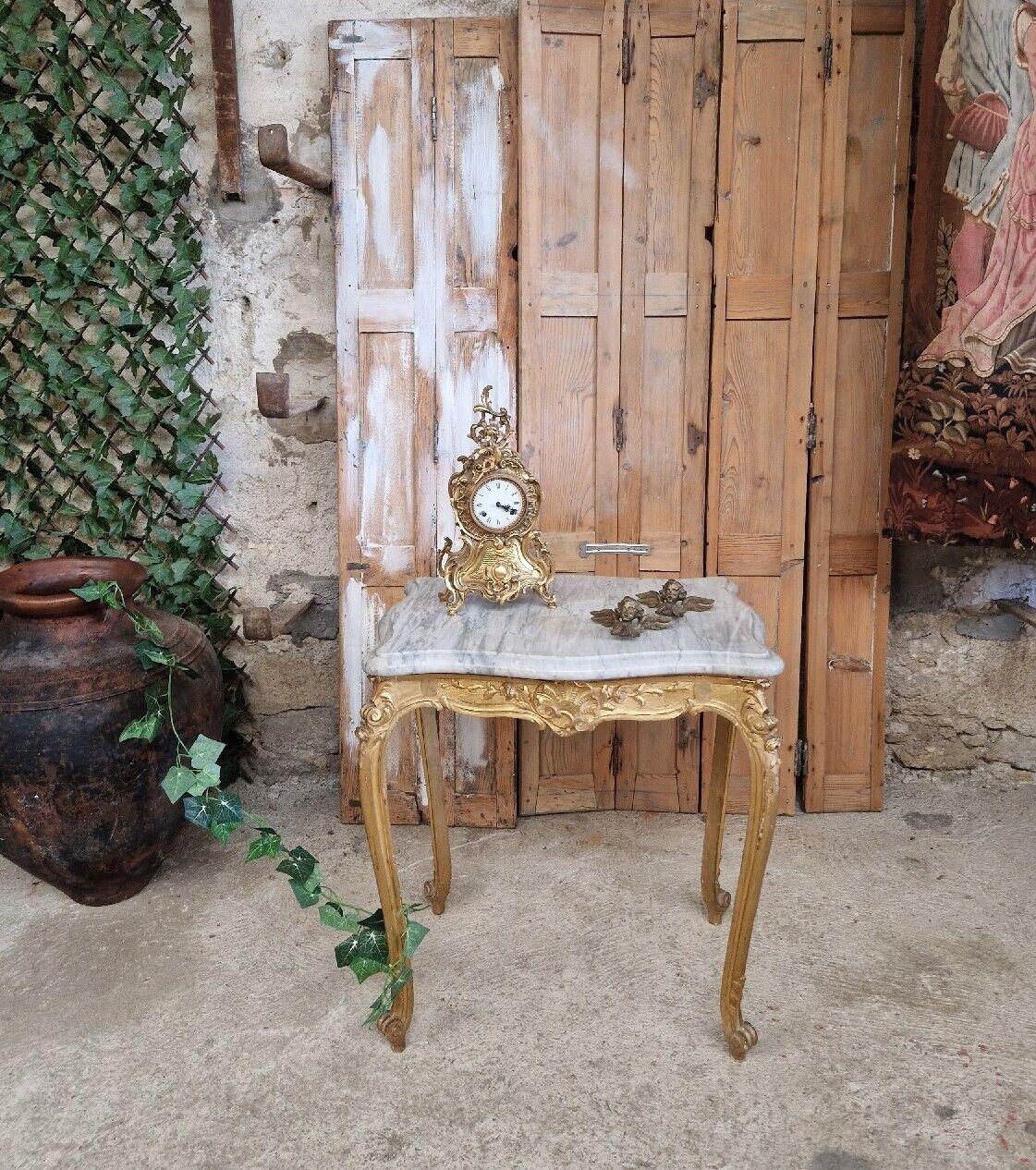 This Beautiful French Accent Table is Rectangular and ideal for many uses and can be housed in any room.

The table base is of gilded wood and of the Louis XV Style. The marble top is a thick White Grey Marble Slab

Circa late 19th
