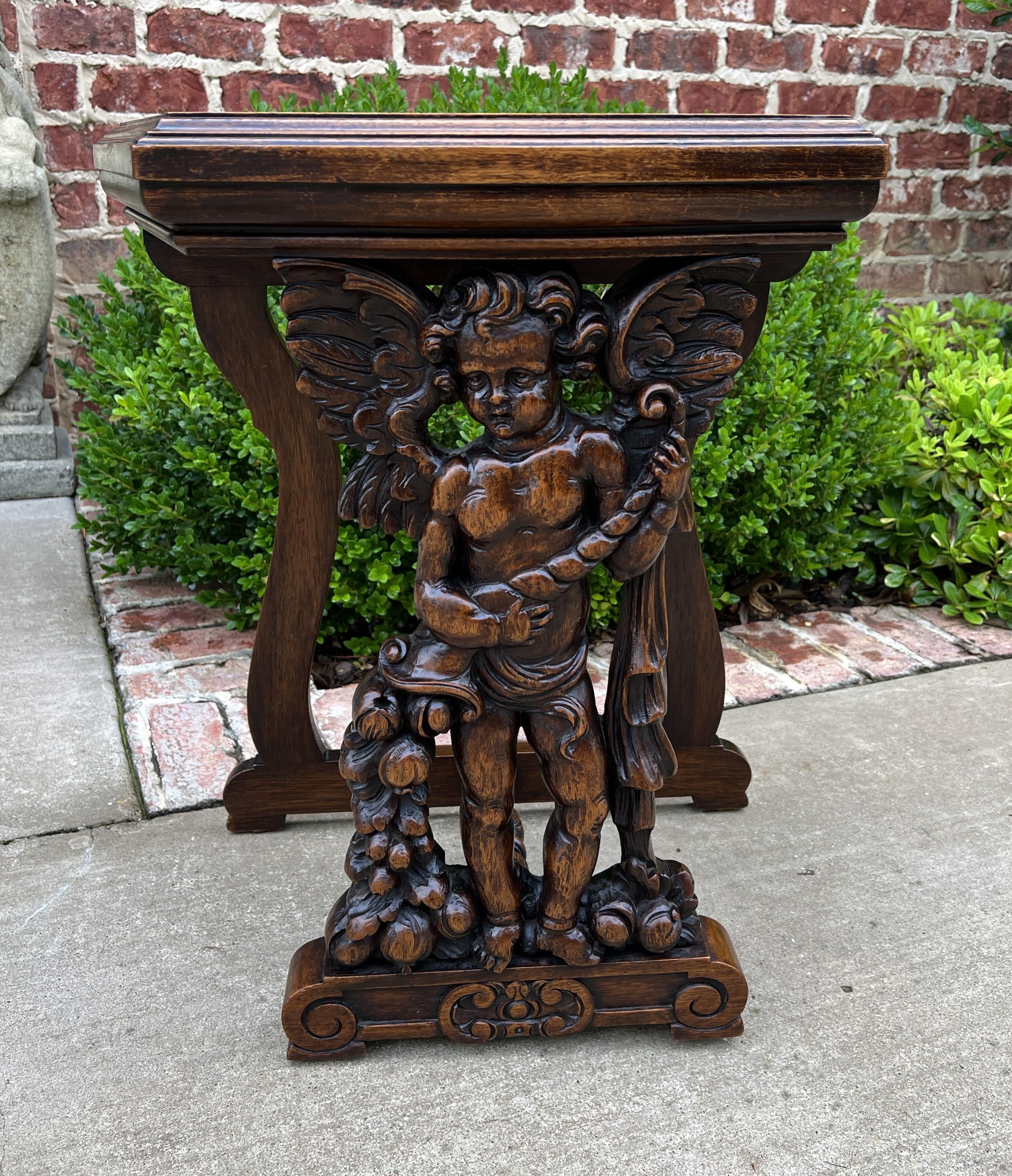 UNIQUE and CHARMING Antique French Walnut End Table, Side Table, Pedestal, or Nightstand with HIGHLY CARVED Cherub and Beveled Edge~~c. 1900

Versatile size~~23.5