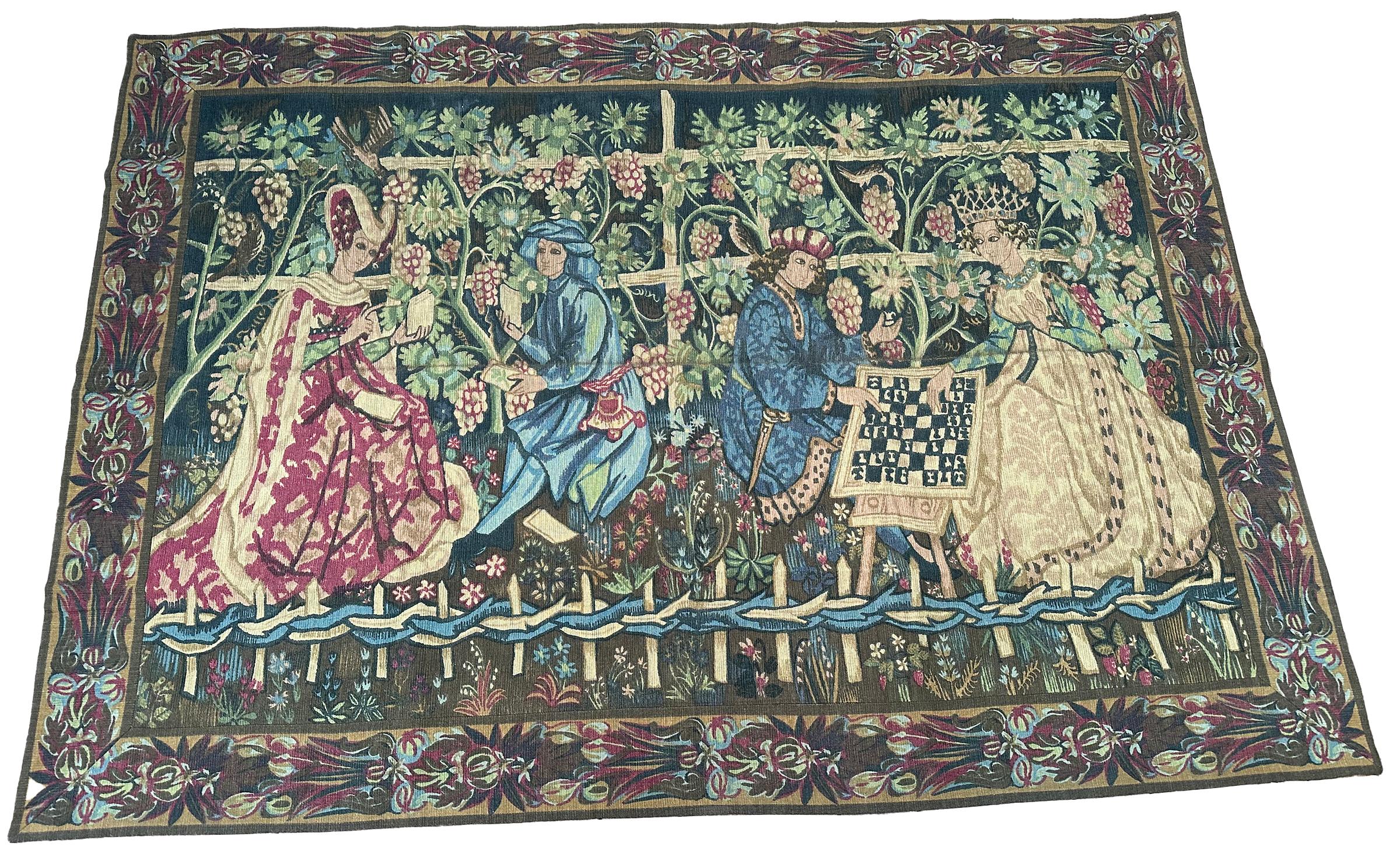 Antiker französischer Wandteppich Verdure Noblemen Royalty Verdure 5x9 158cm x 272cm 1920

Ein prächtiger antiker französischer Wandteppich, der eine Szene mit Adligen inmitten von exotischem Grün und Blumen zeigt. Schöne Farbgebung und eine