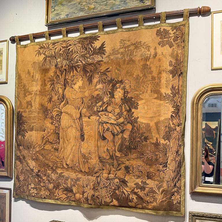 Antique French Tapestry with Gold Binding on Fluted Wood Rod Hanger at
