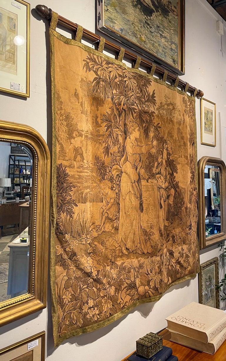 Antique French Tapestry with Gold Binding on Fluted Wood Rod Hanger at