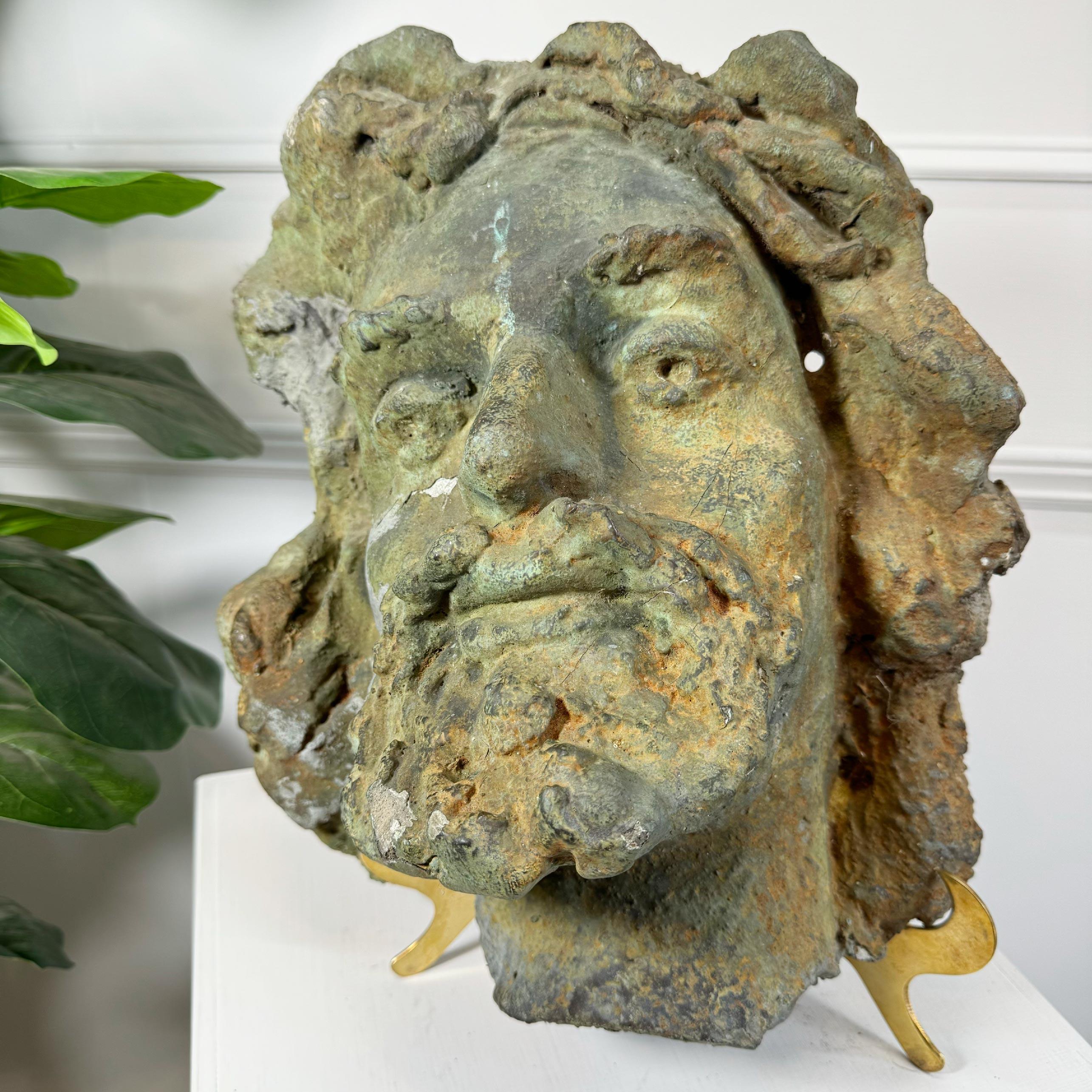 An impressive and large scale terracotta head of a bearded man, French,19th century, old repairs and reinforcements, a striking and captivating piece.



Wall mounted, there are two holes for mounting either side of the face.



Height 37cm, Width