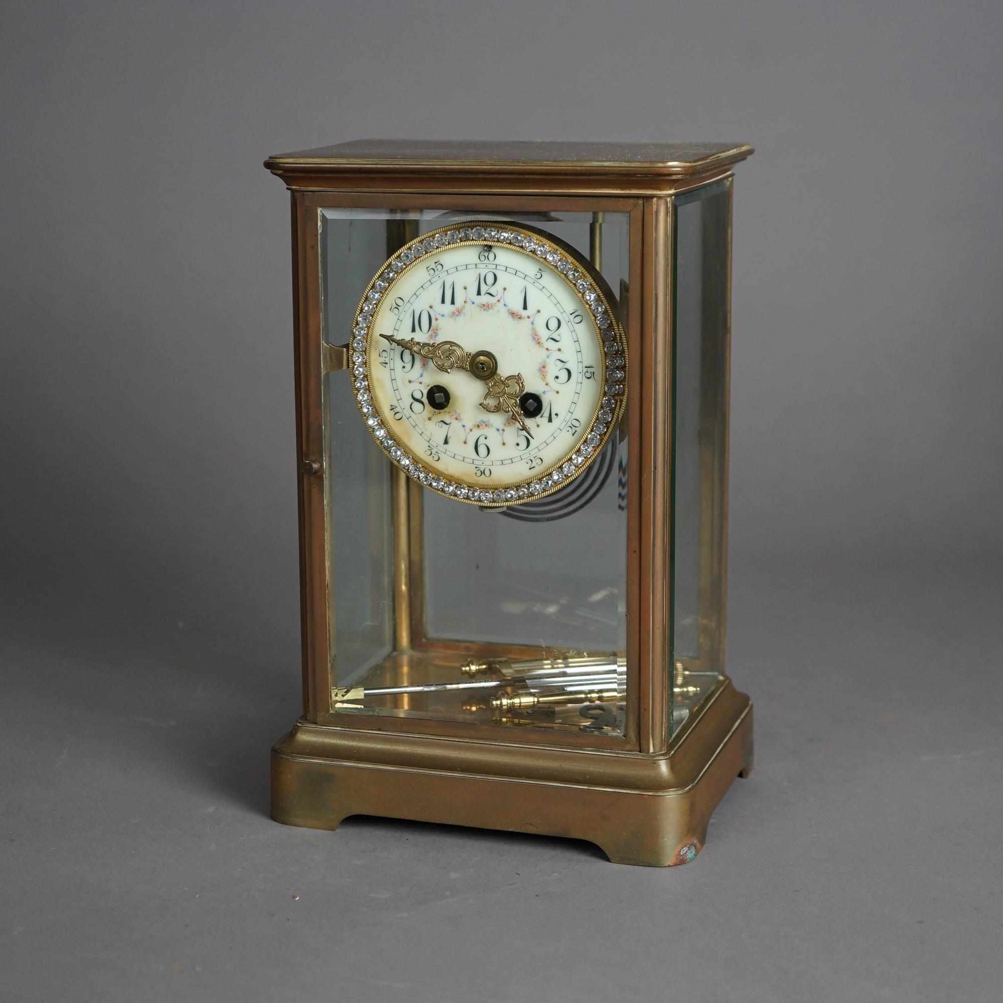 An antique crystal regulator clock in the manner of Tiffany & Co. offers porcelain face, with jeweled trimming and identifying stamp en verso as photographed, 19th century

Measures- 10.75''H x 7''W x 5.5''D