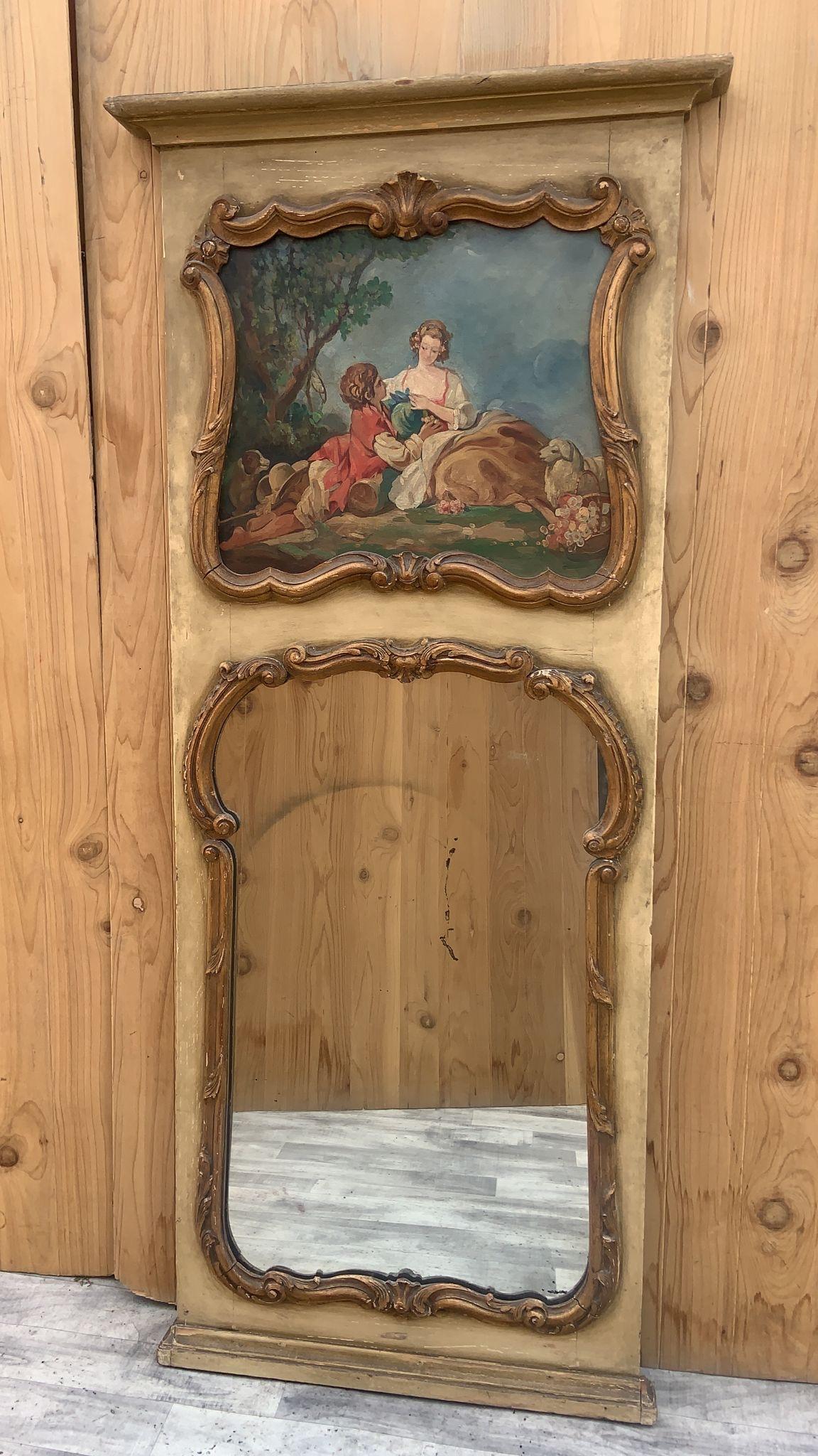 Antique French Trumeau Parcel Gilt Mirror with Painted Canvas 

This beautiful late 1800s French Trumeau Parcel-Gilt Wall/Mantel Mirror has an oil painting that is a romantic hillside picnic scene. Beautiful antique French imported piece sure to