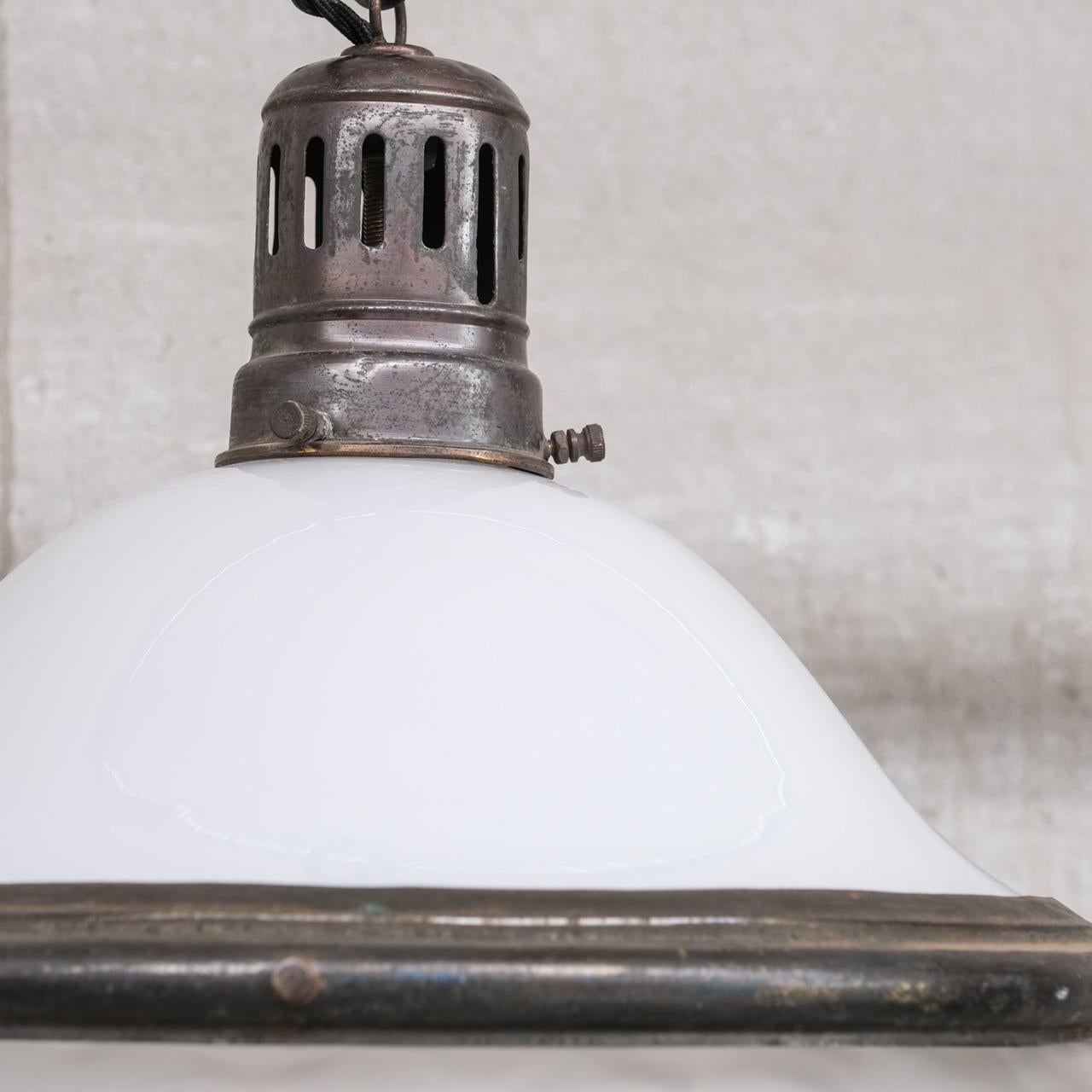 An exceptional antique pendant light.

France, c1920s.

Opaline glass top, cloudy opaque base glass with a naturally patinated gallery, rim and finial.

Good vintage condition, patina commensurate with age.

Re-wired and PAT tested.

No