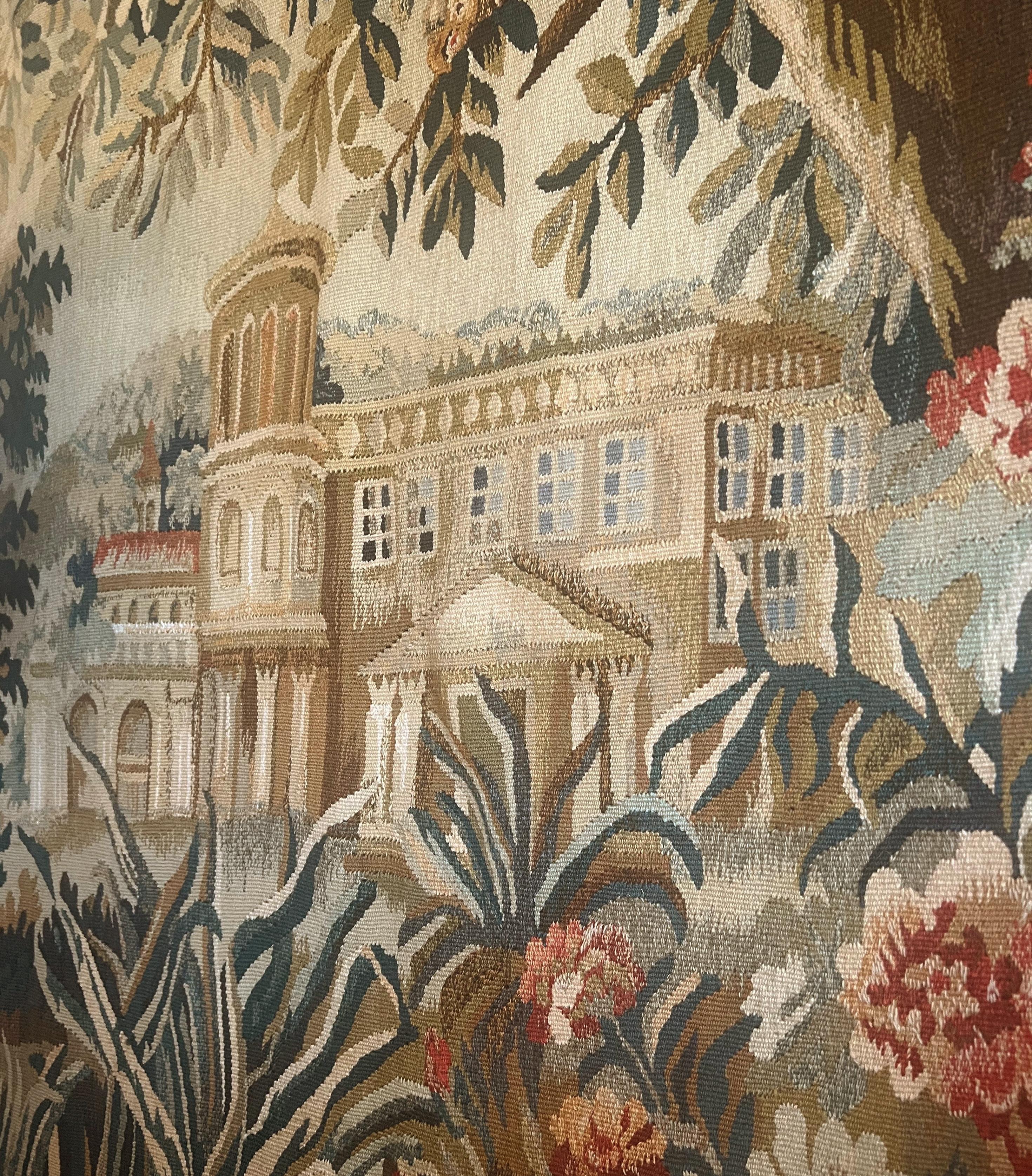 Antique French Verdure Tapestry. Depicts a beautiful European landscape w/ a castle in the background.