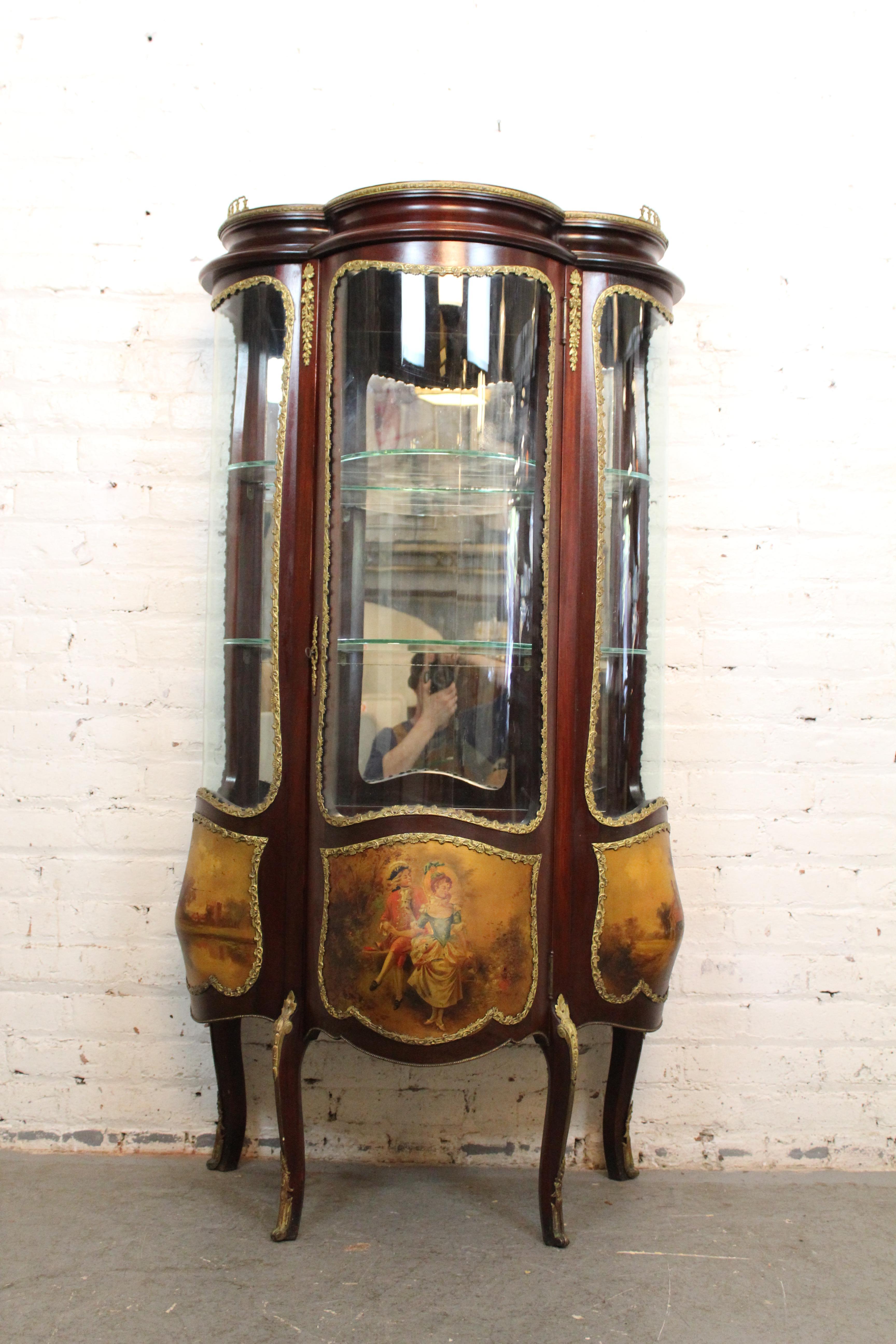 Give any room both a worldly appeal and a sense of history with this fantastic, hand-painted vernis Martin bomb vitrine! Built in the legendary Louis XV style by artisanal French craftsmen of the late 19th/early 20th century, this ornate display