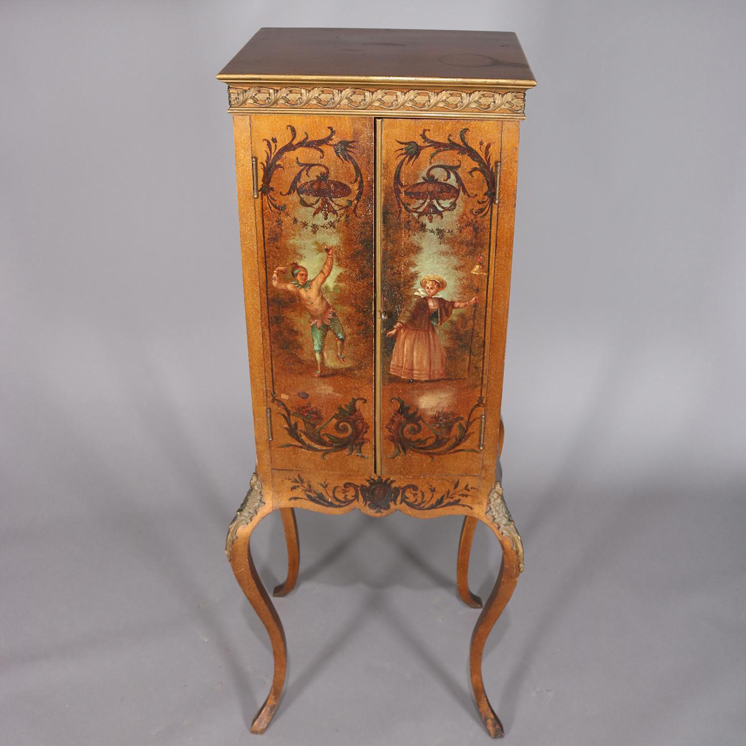 Antique French petite cabinet features Vernis Martin School courting and landscape scenes on giltwood with cast foliate attachments with double blind doors opening to shelved interior and seated on cabriole legs, circa 1890

Measures: 57.25