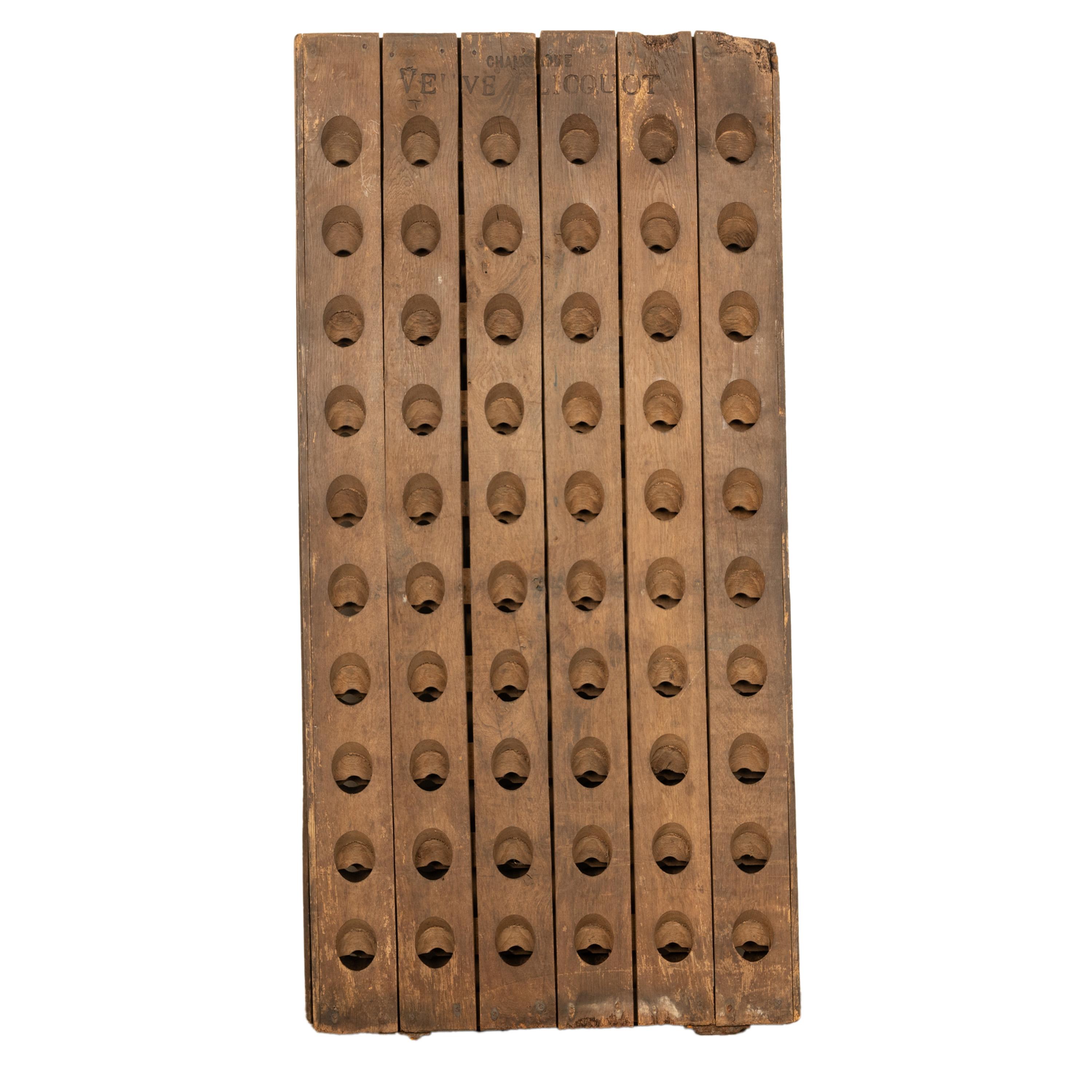 An antique late 19th century French Champagne riddling wine 120 bottle rack. 
An original 19th century champagne bottle riddling wine rack, the rack in an 'A' frame shape, it will hold 60 bottles on each side, so 120 bottles in total.
The rack has
