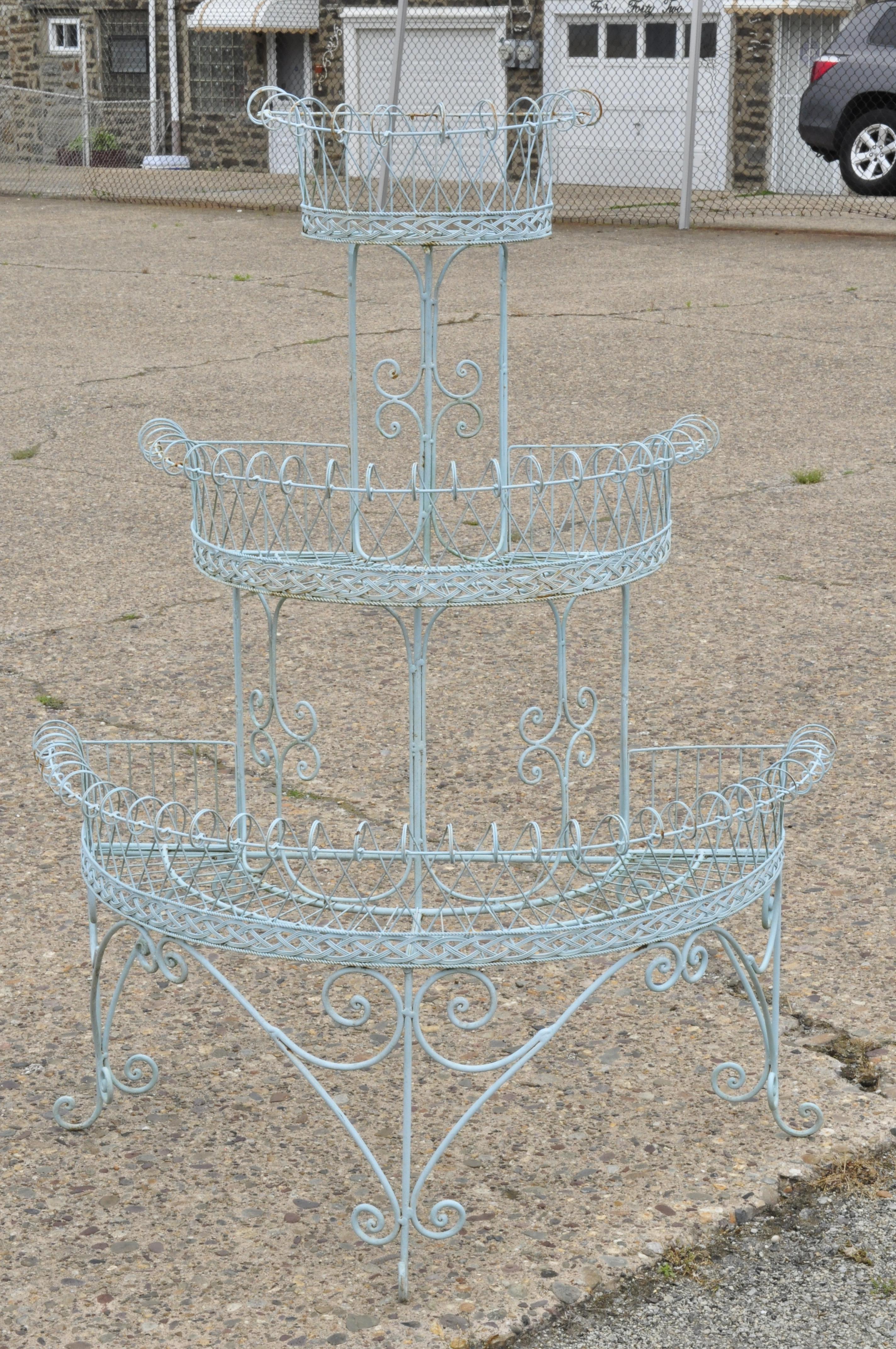 Vintage French Victorian 3-tier blue iron wire metal planter plant stand, circa mid-20th century. Measurements: 54