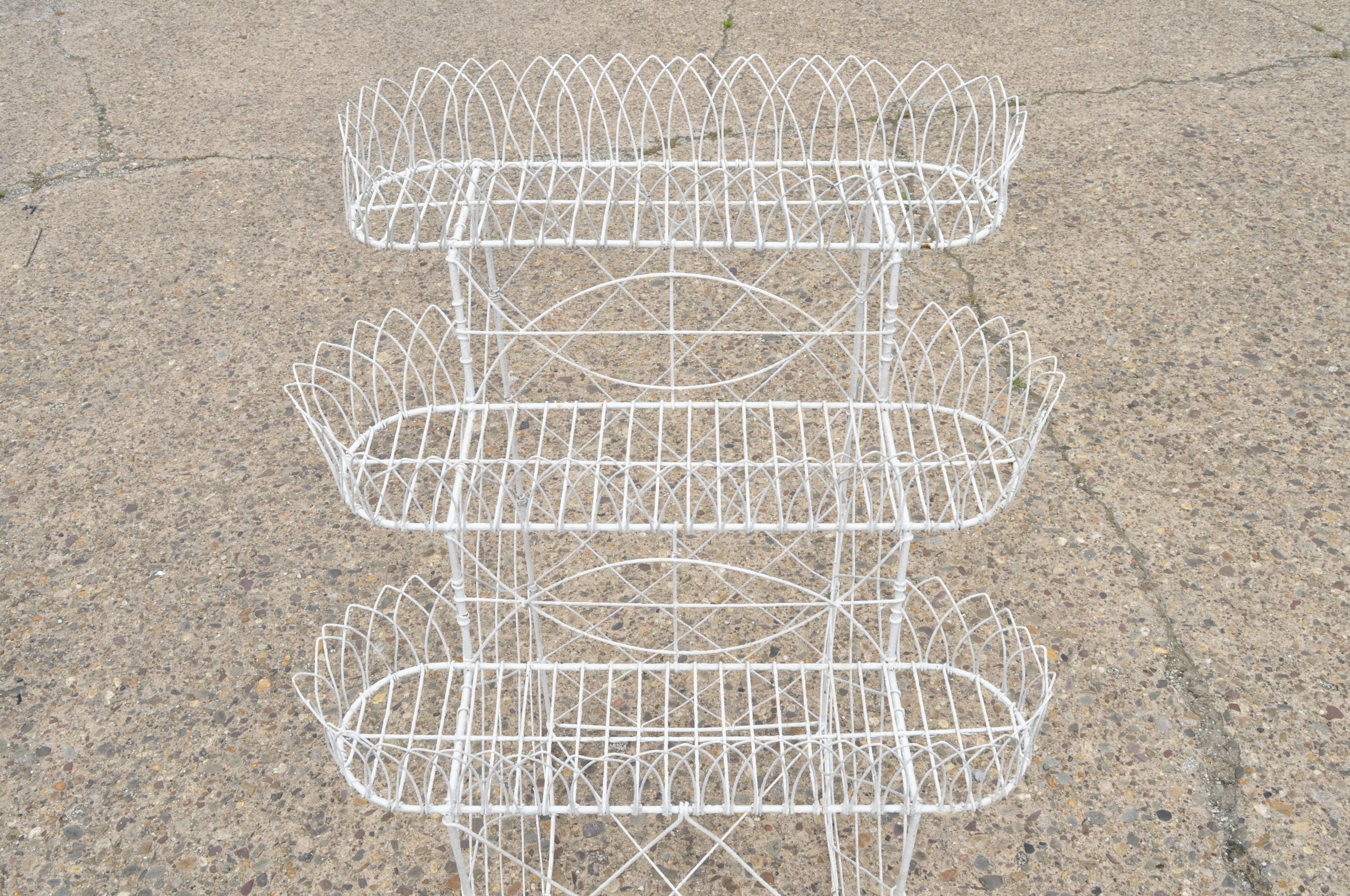white metal plant stand