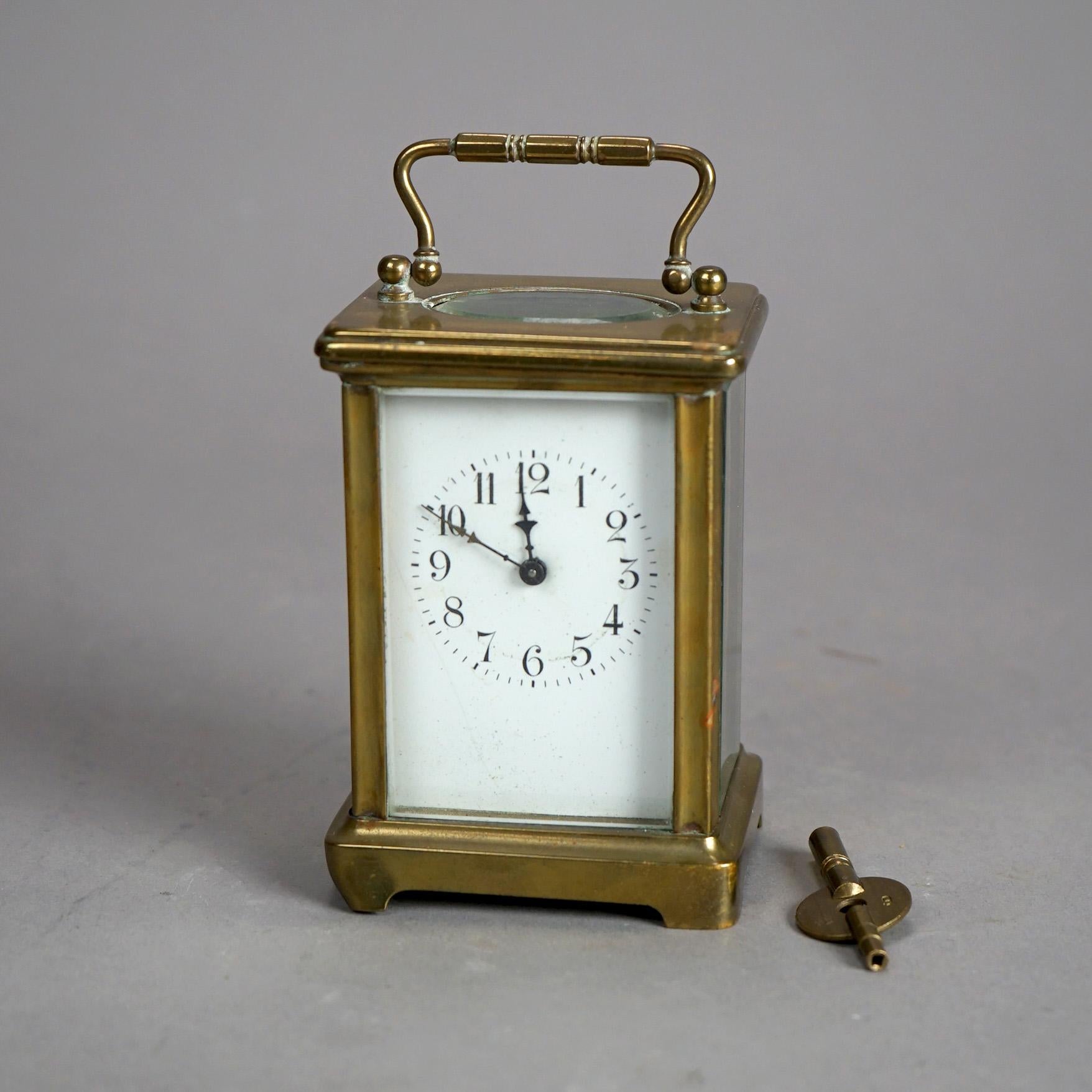 Antique French Victorian Brass & Crystal Carriage Clock with Key, embossed MADE IN FRANCE, Circa 1890

Measures- 6''H x 3''W x 2.5''D