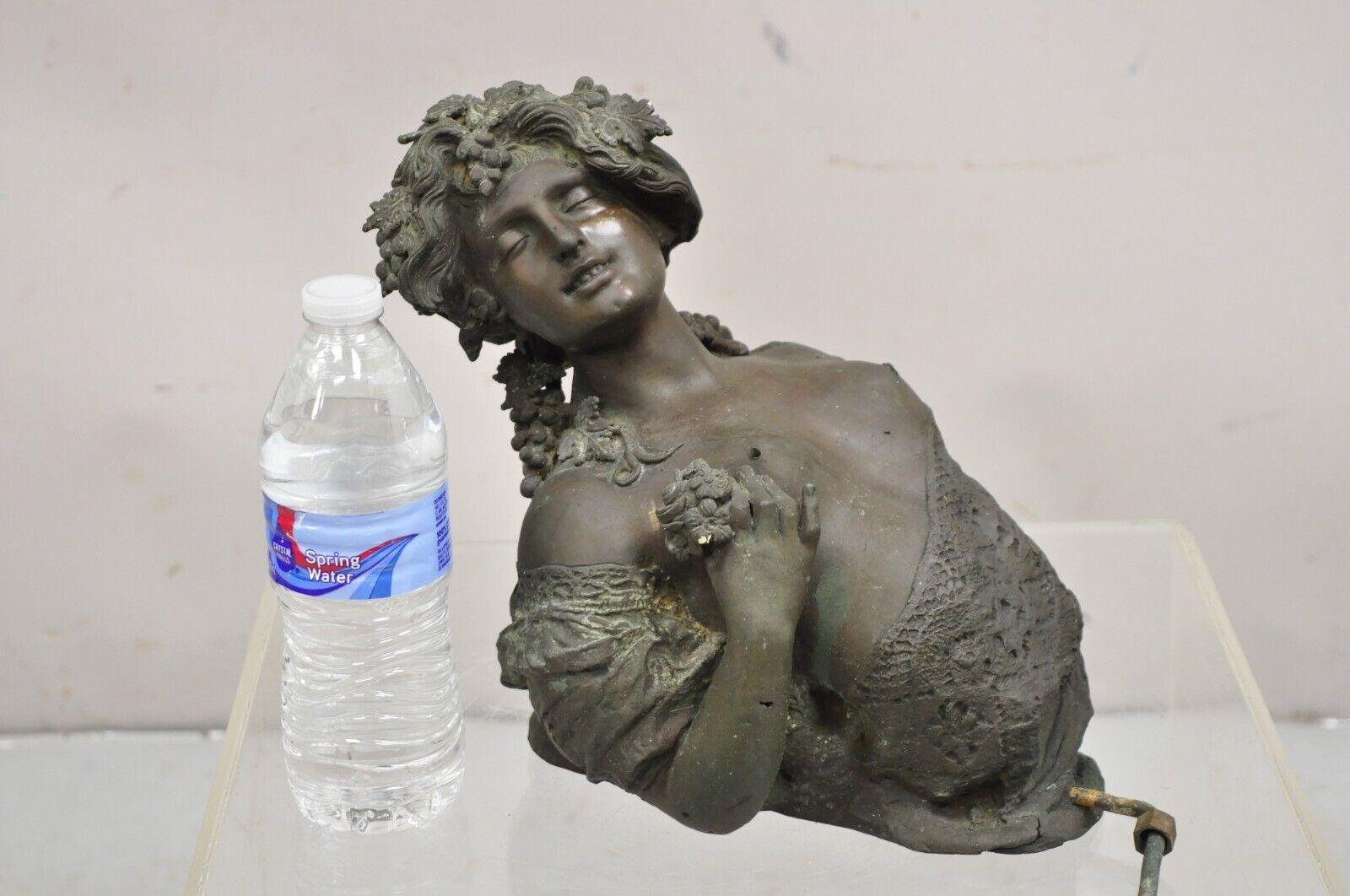 Antique French Victorian Bronze Female Bust Wall Mounted Garden Water Fountain Architectural Element. Item features holes to woman's bosoms' for water flow (have not seen the piece in use nor tested), nice bronze casting, unique antique item. Circa