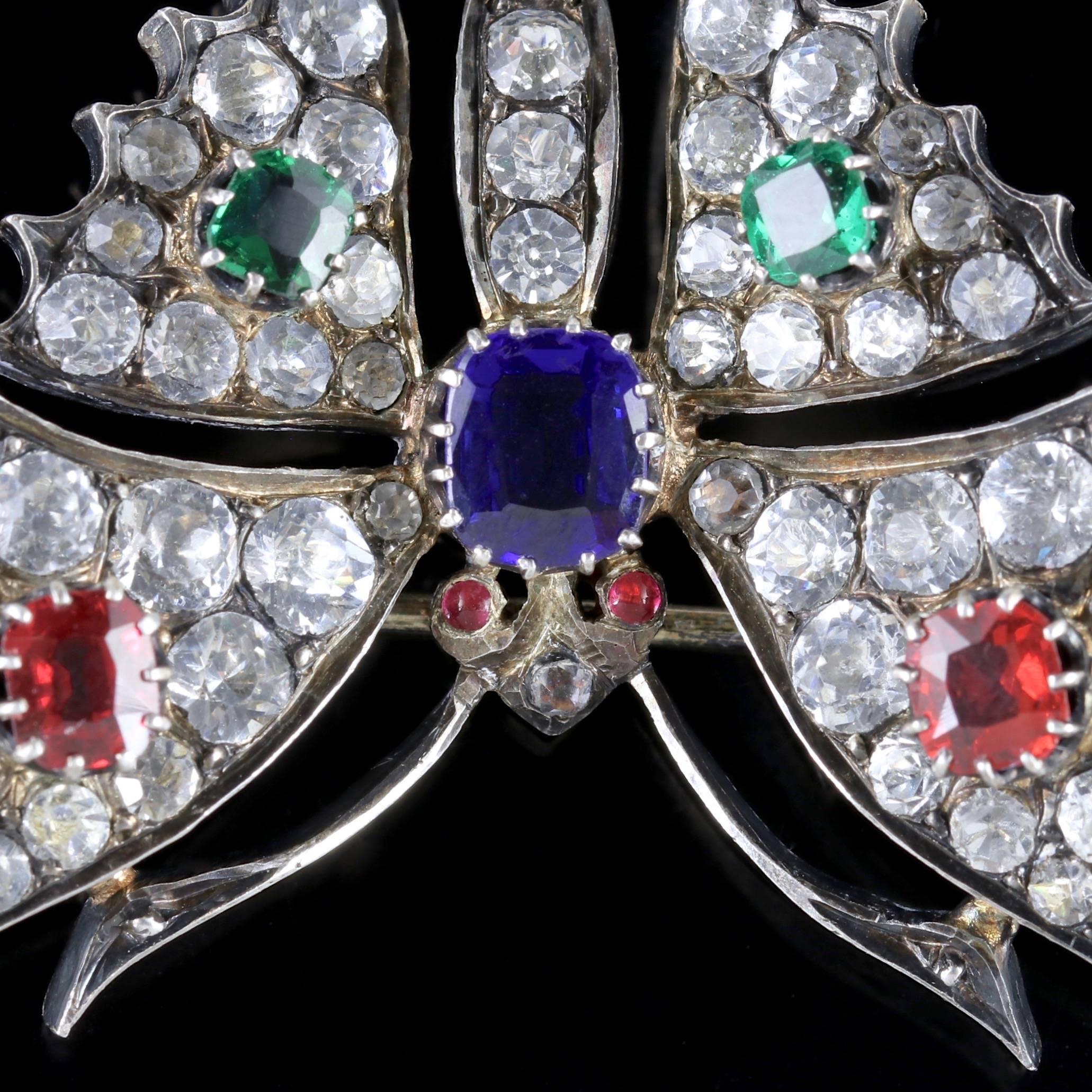 To read more please click continue reading below-

This fabulous antique French butterfly brooch was made during the Victorian era, Circa 1870.

The wonderful butterfly is adorned with sparkling white Paste stones with two green Emeralds and two