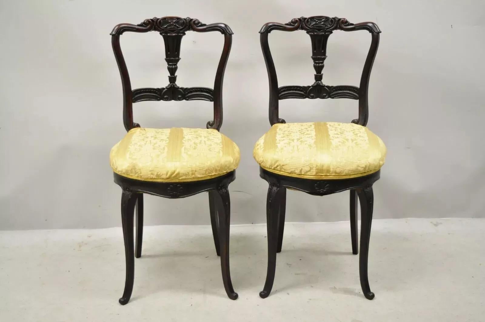 Antique French Victorian Carved Rosewood Small Petite Accent Side Chairs - Pair. Item featured has a small petite size, beautiful dark rosewood frames, upholstered seats, nicely carved details, petite cabriole legs, very nice antique pair. Circa