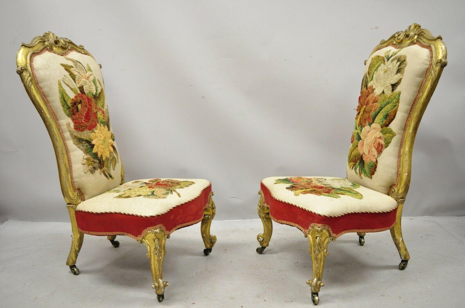 Antique French Victorian gold gilt Rococo Revival Slipper Parlor chairs - a pair. Item features rolling casters, crewel work embroidered upholstery, gold gilt finish, solid wood frame, nicely carved details, very nice antique item, circa late 19th