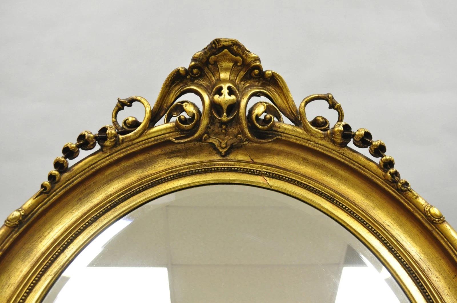 Unknown Antique French Victorian Gold Gilt Scroll Oval Beveled Glass Wall Mirror For Sale
