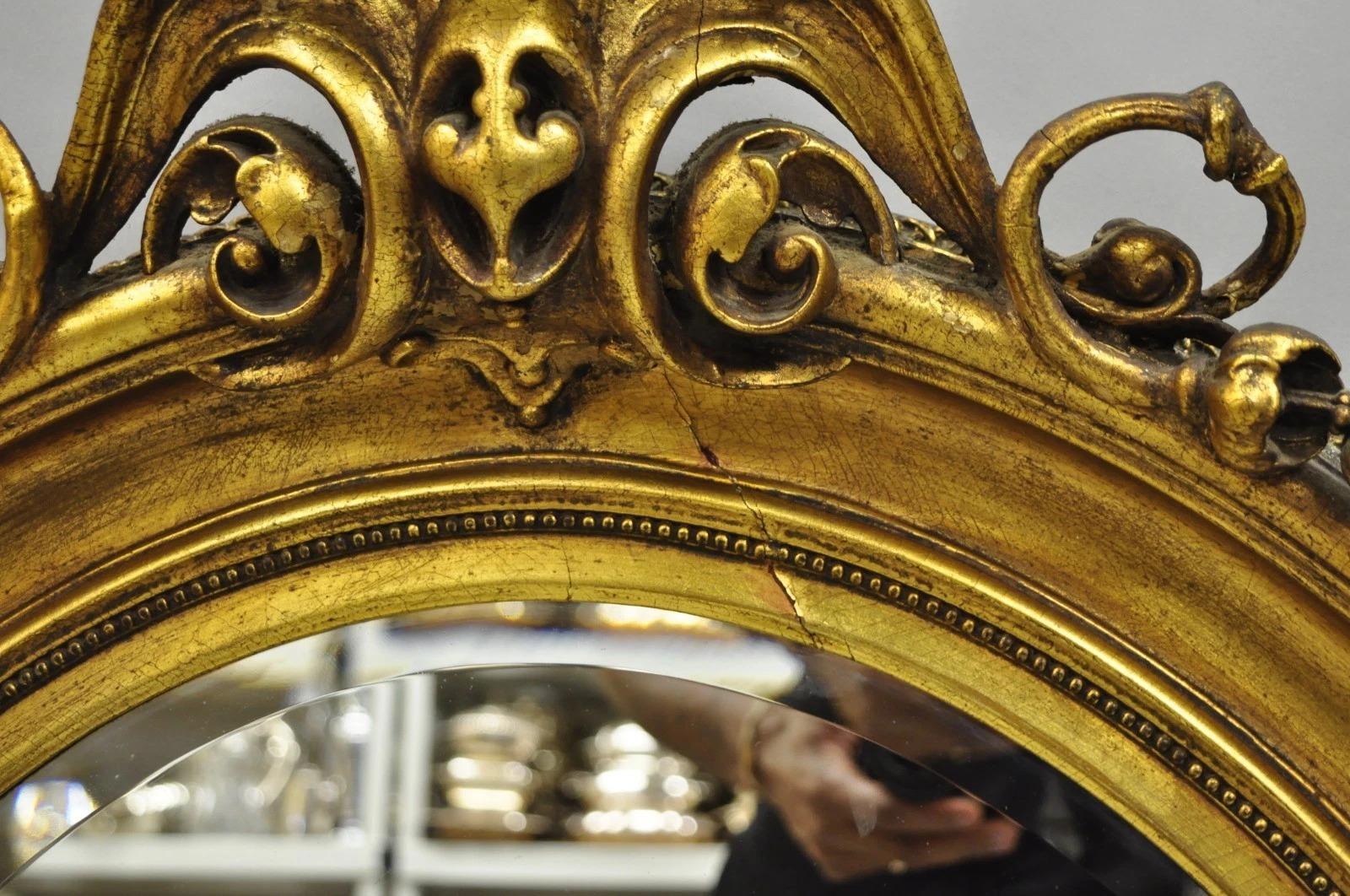 Wood Antique French Victorian Gold Gilt Scroll Oval Beveled Glass Wall Mirror For Sale